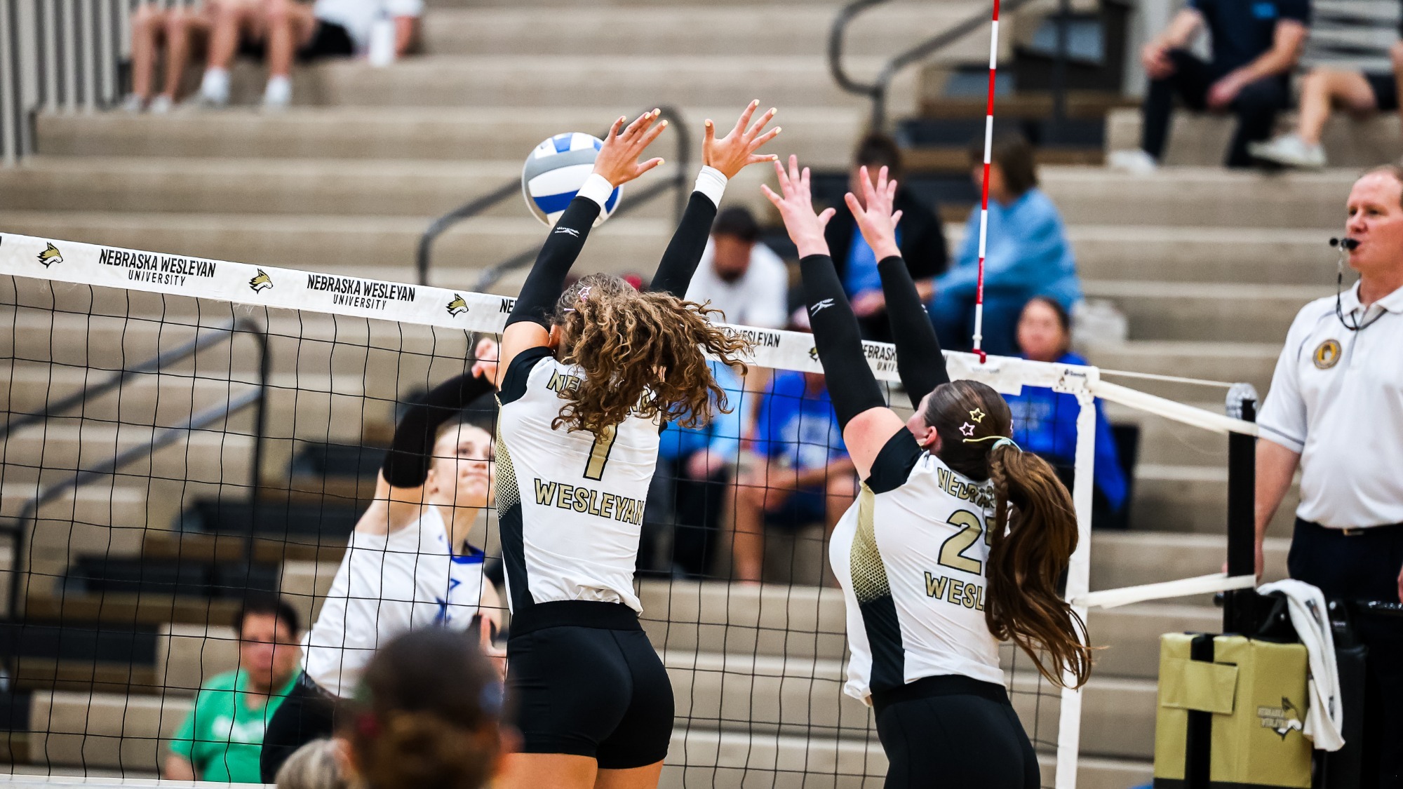Ella Foote & Molly Ramirez go for a block