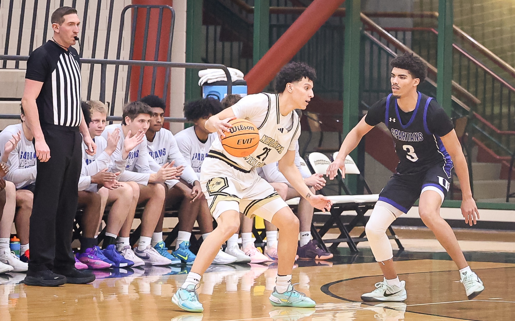 Christian Winn sizes up his defender