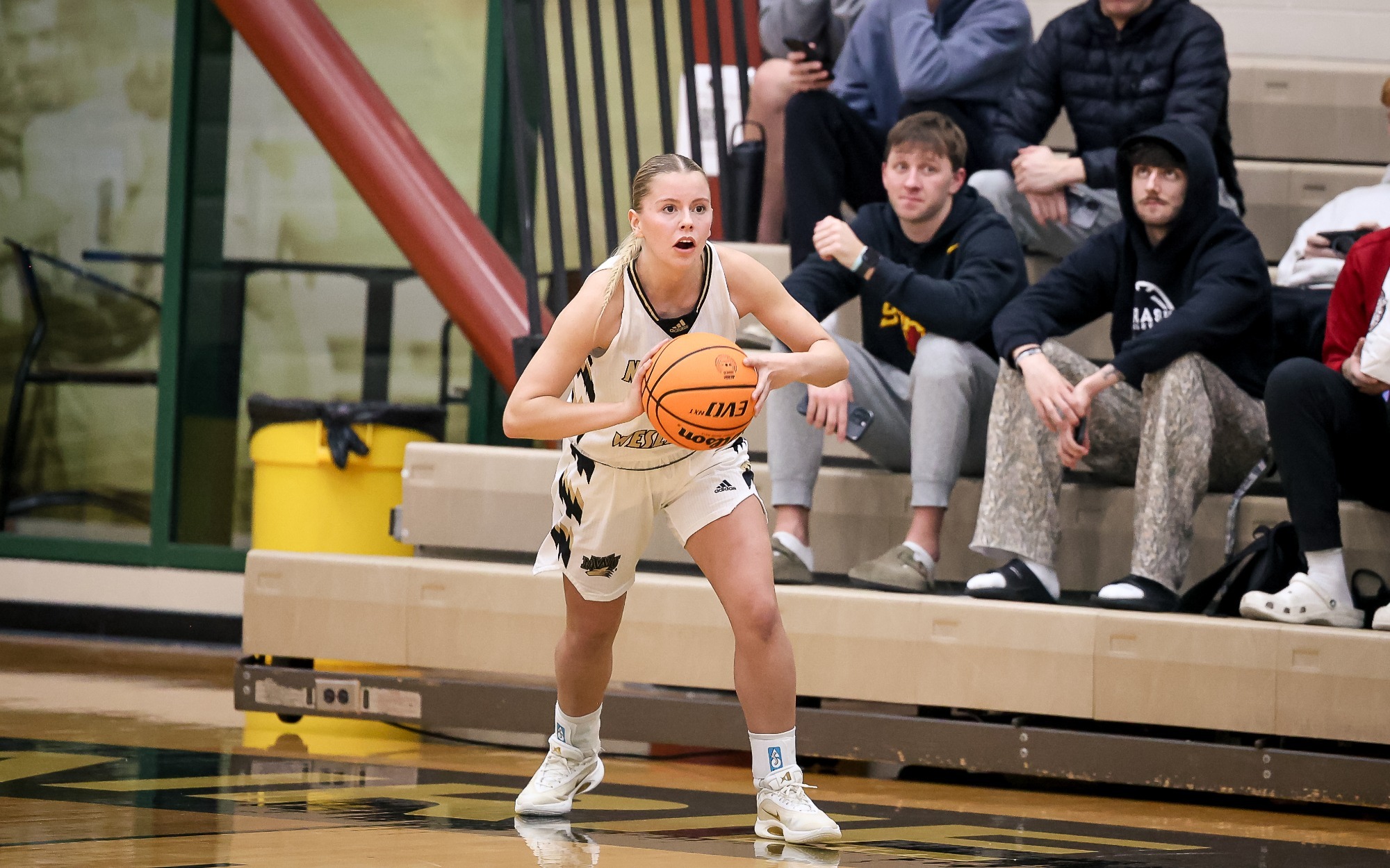 Brynn Sebek inbounds the ball.