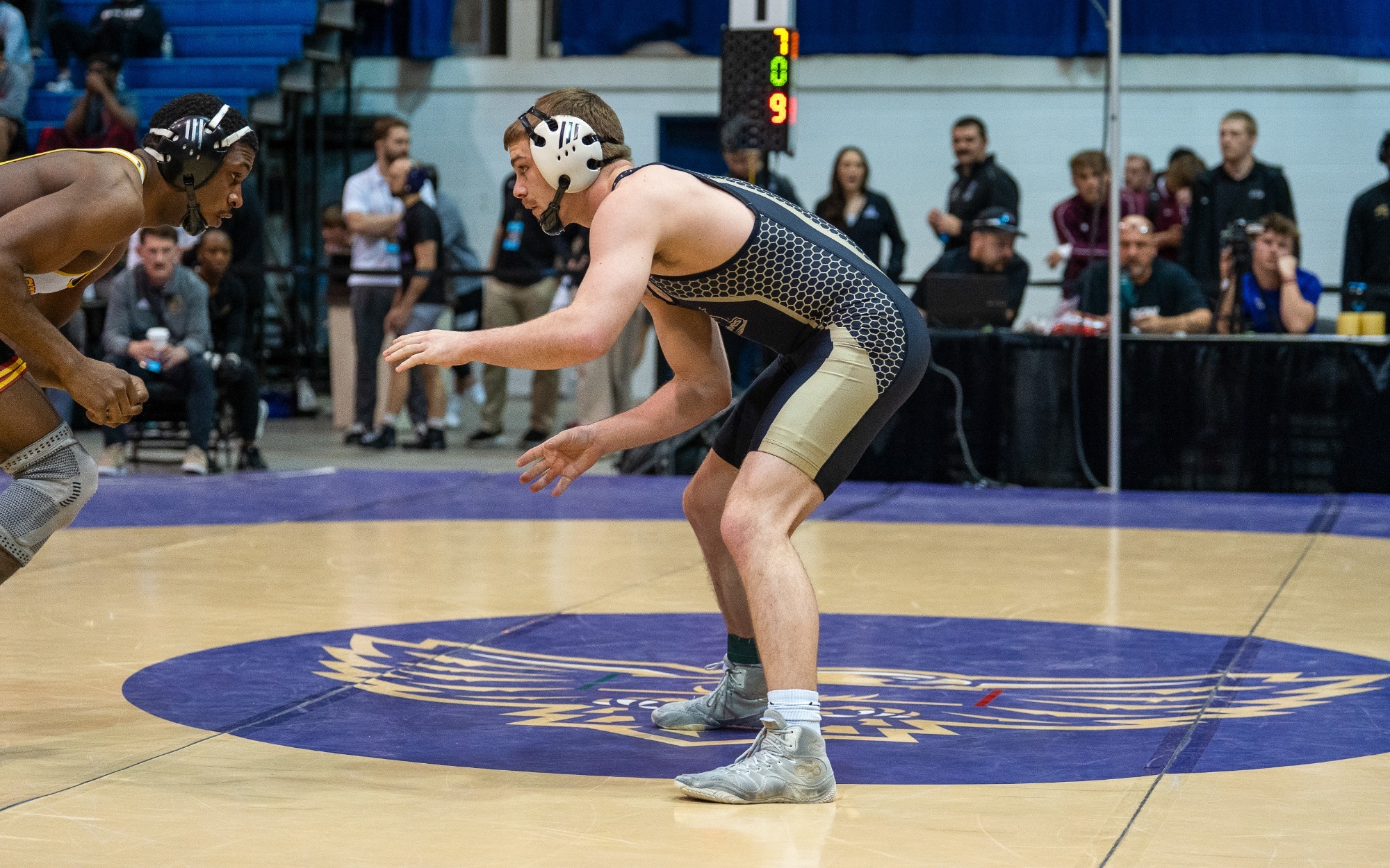 Trev Halsey hand fights with an opponent at NCAA Regionals