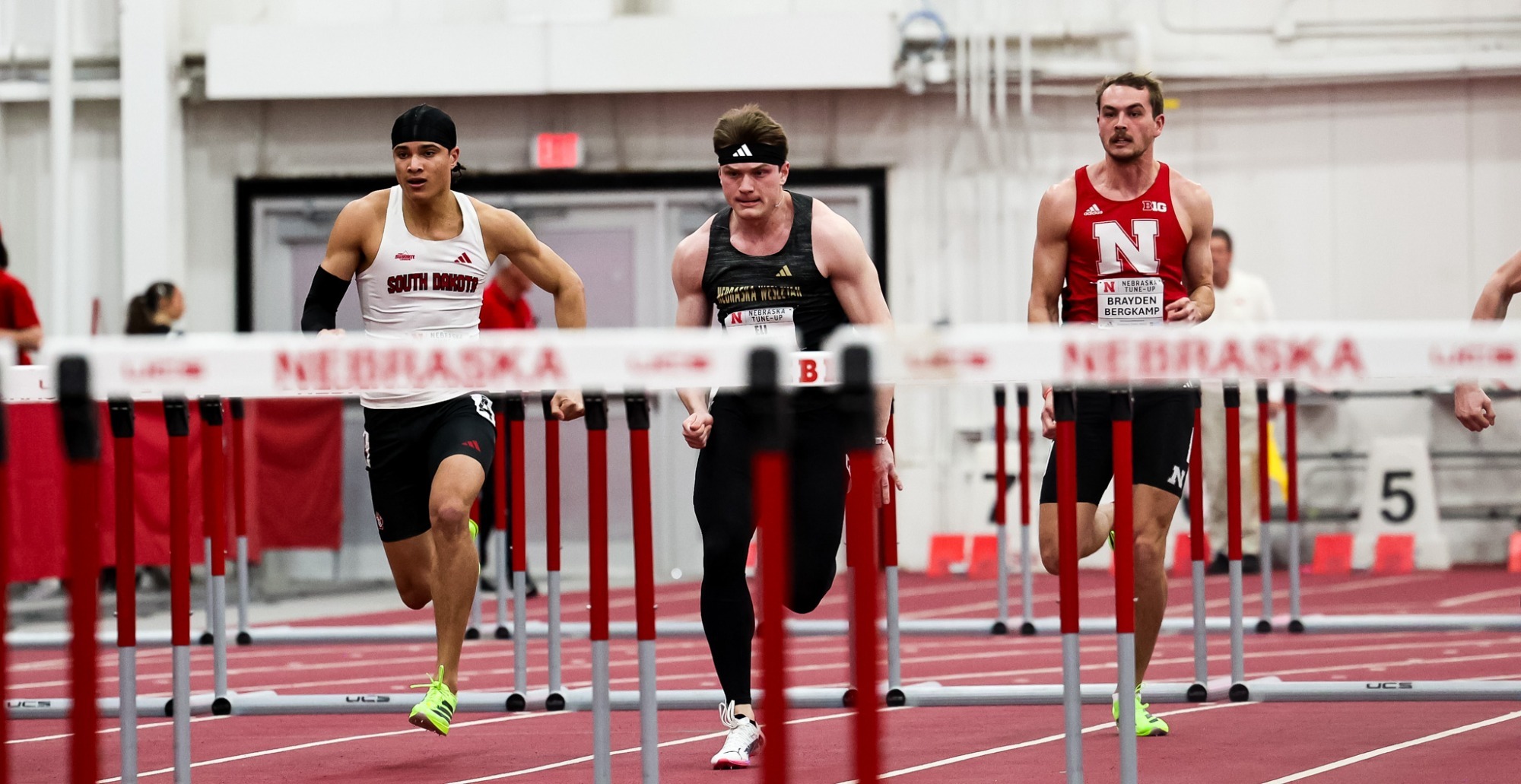 Eli Etherton sprints towards the hurdles