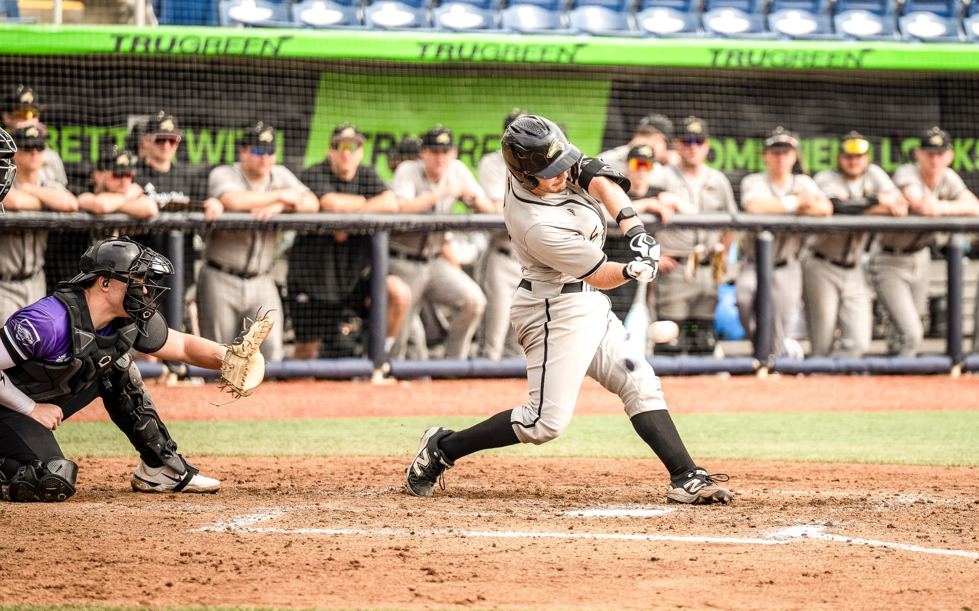 Jake Shedarowich drives a ball with power