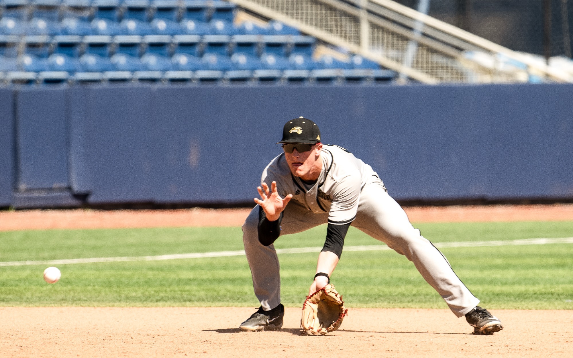 Easton Johnson fields a hard ground ball at third base