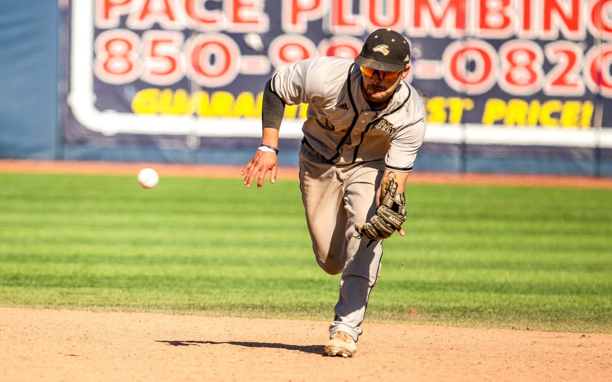 Duncan Ortega fields a ground ball on the run