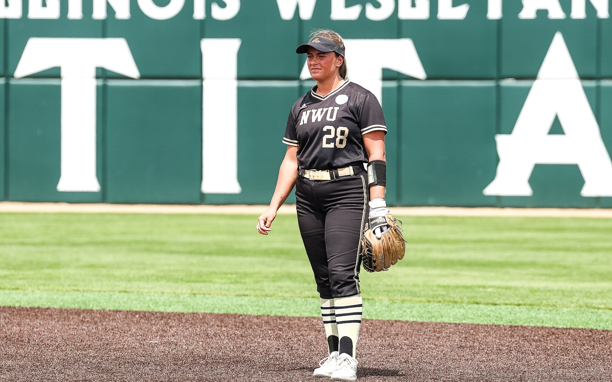 Jenna Kimberling stands awaiting a pitch at the second base position