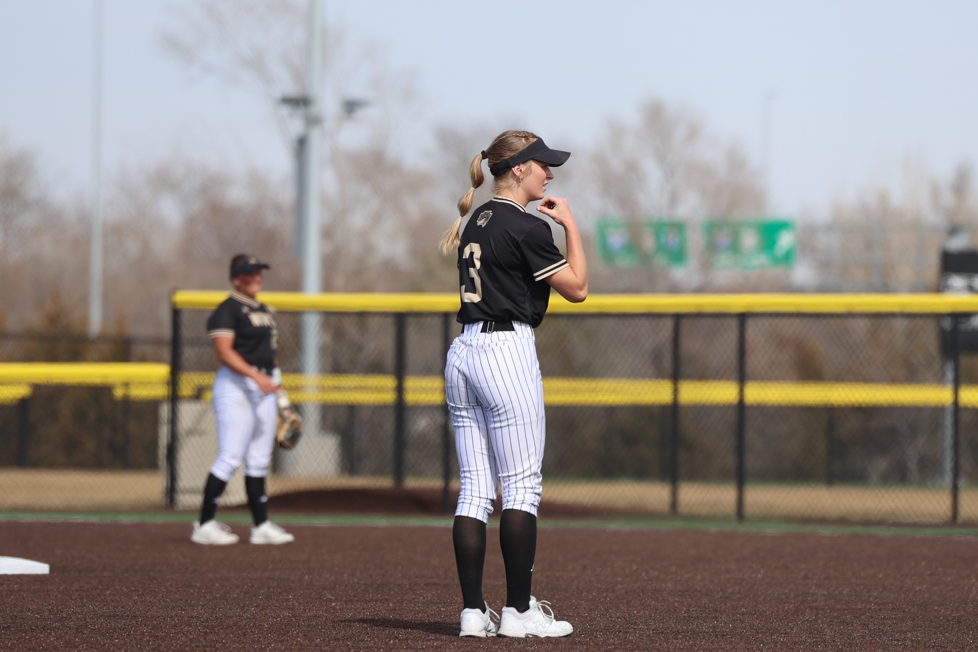 Eva Fahrnbruch prepares for a pitch at shortstop