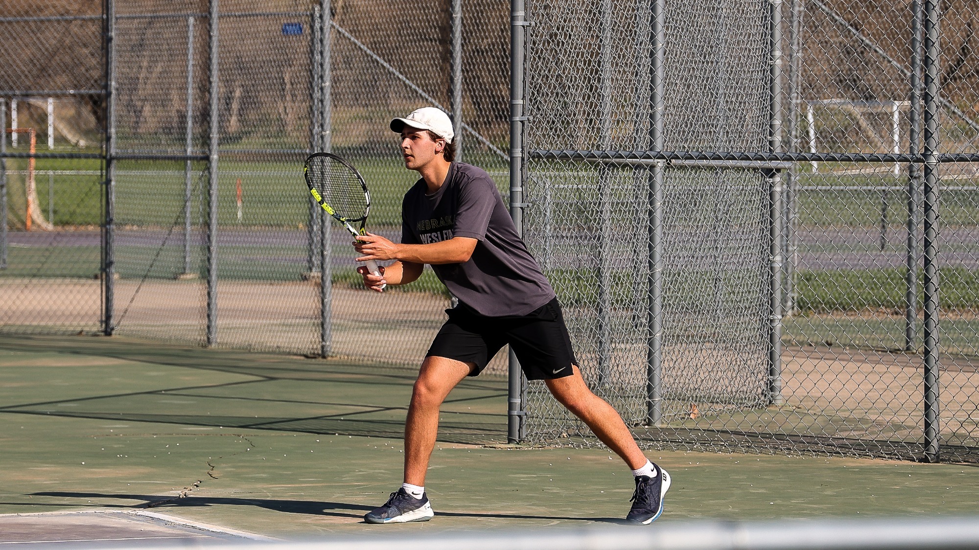 Glenn McChristian prepares to return a serve