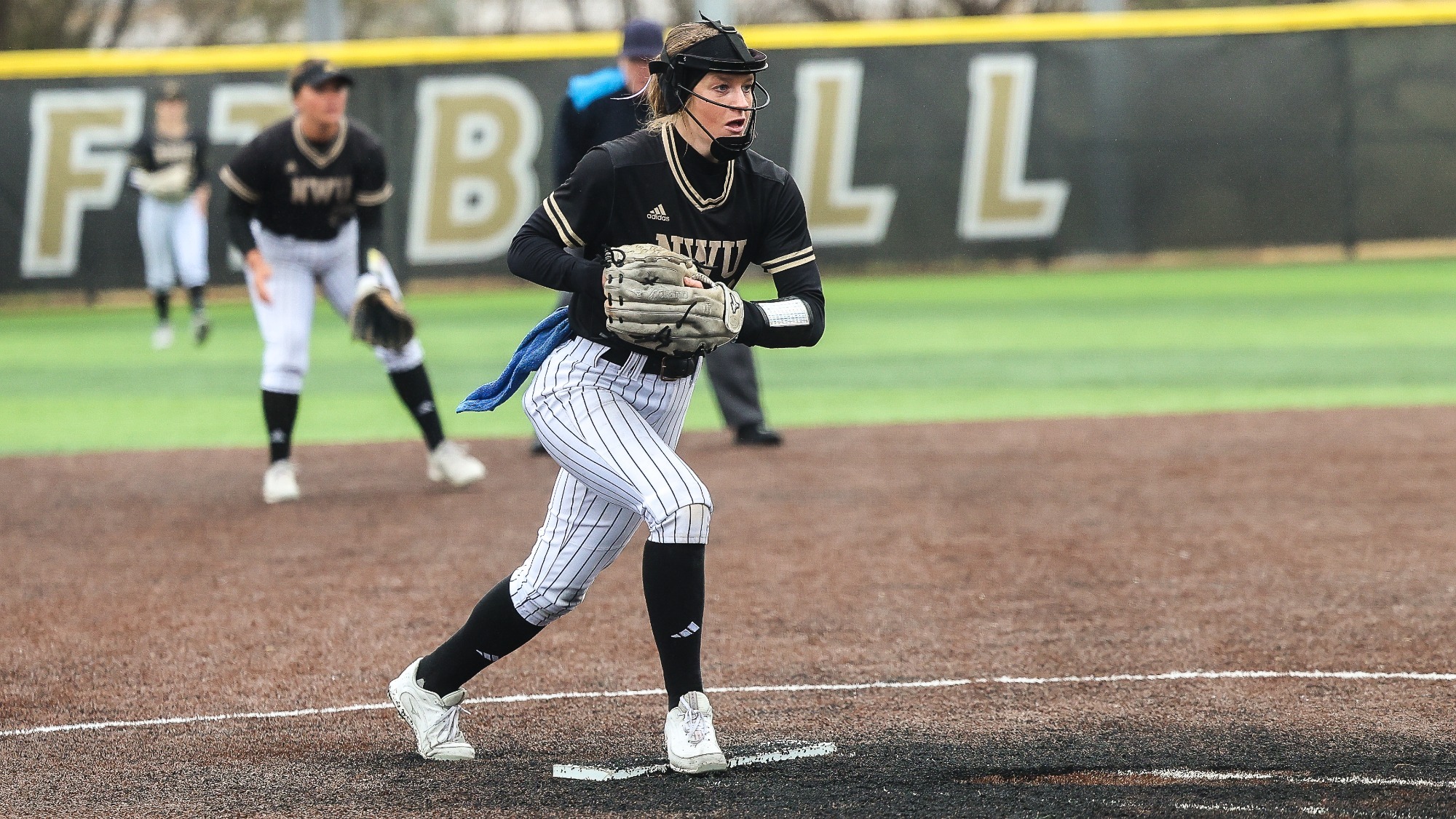 Eva Fahrnbruch steps up to the mound to fire in a pitch