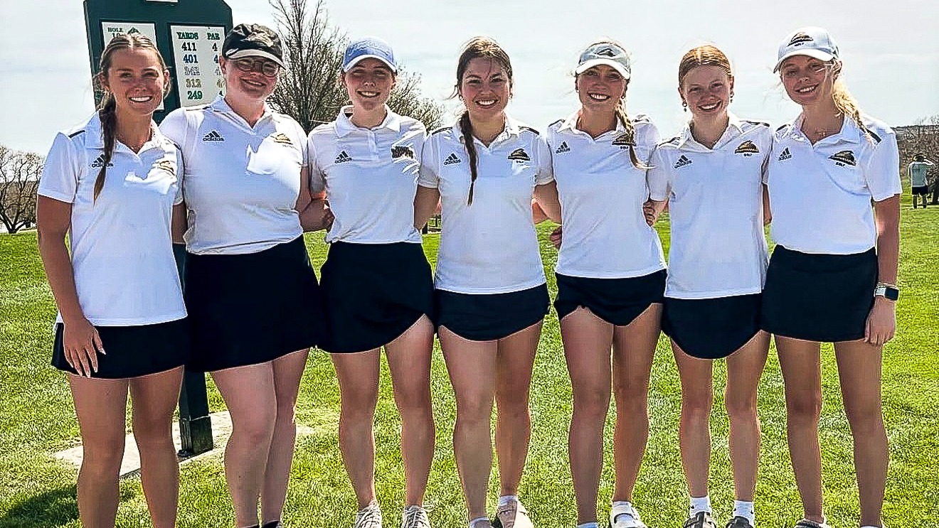 Women's Golf team pose for a team photo