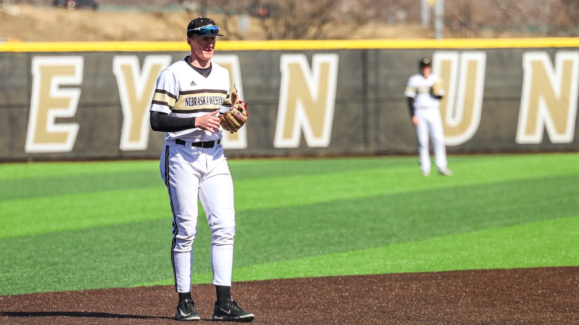 Easton Johnson stands in position at his third base position.