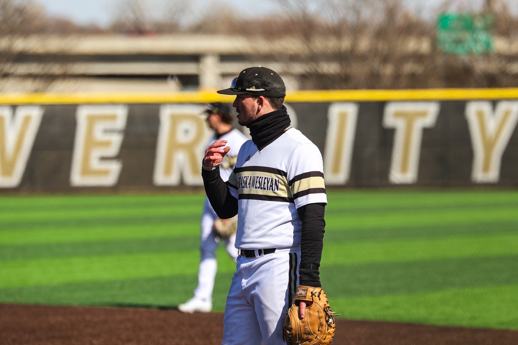 Brady Bell stands at first base awaiting the next pitch