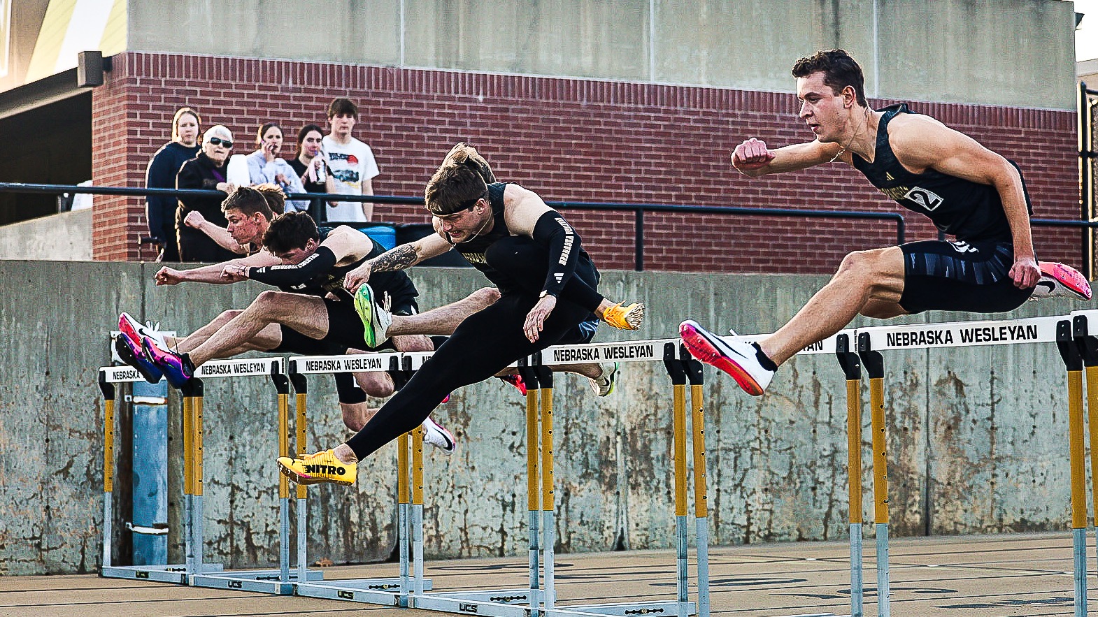 Eli Etherton flies over the hurdles