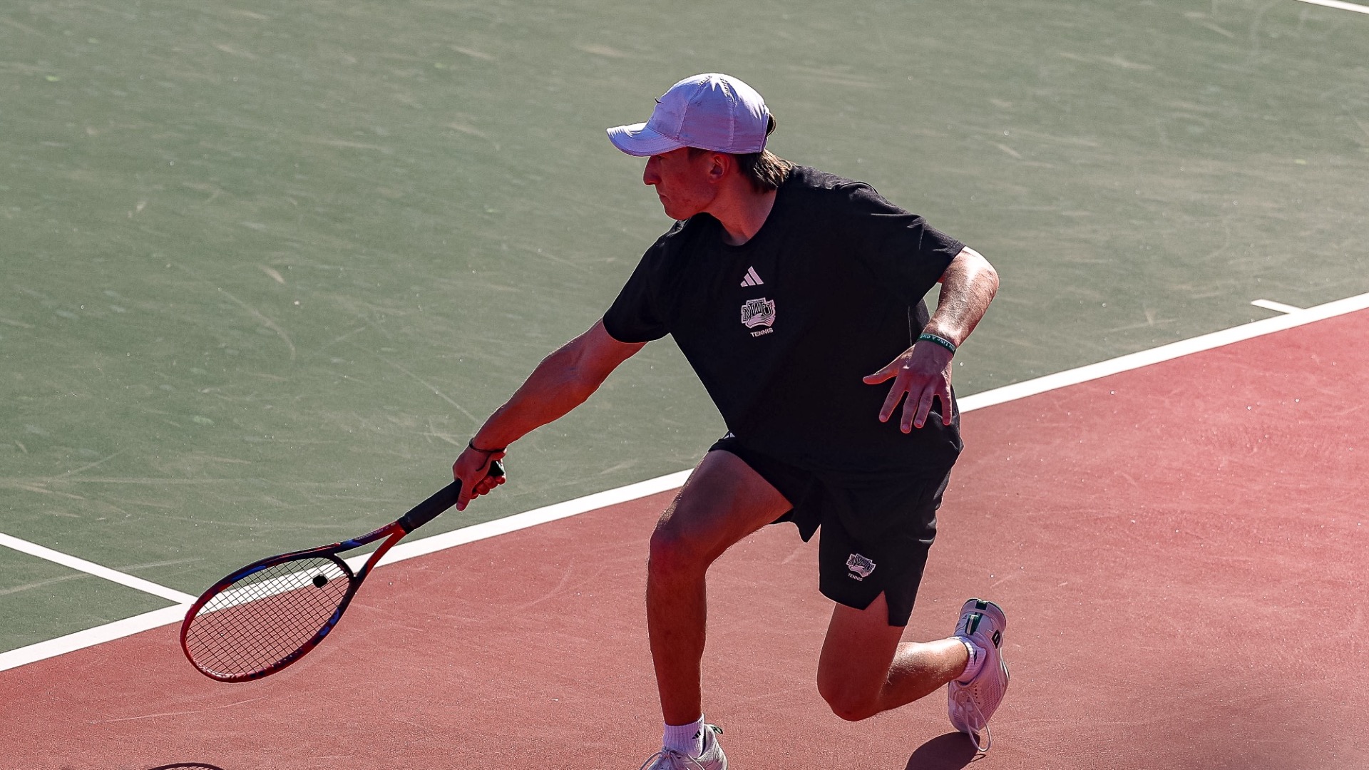 Ashton Rames reaches for a ball