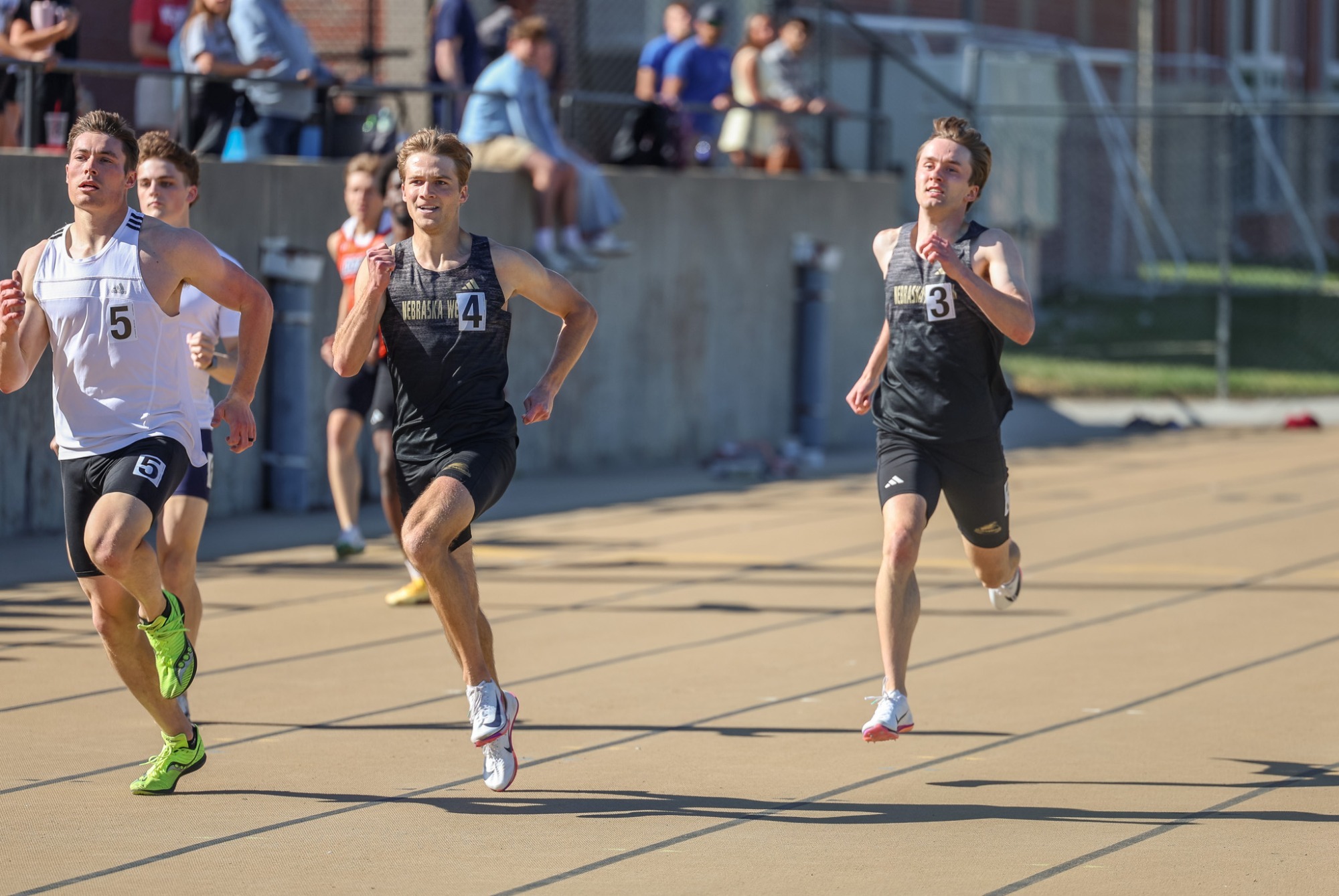 McClain Meyer hits the home stretch of the 400 meter dash at the Prairie Wolf Invite