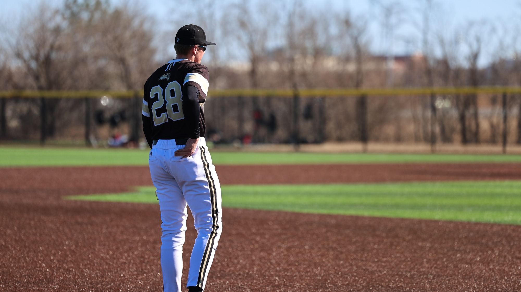 Easton Johnson stands at third base