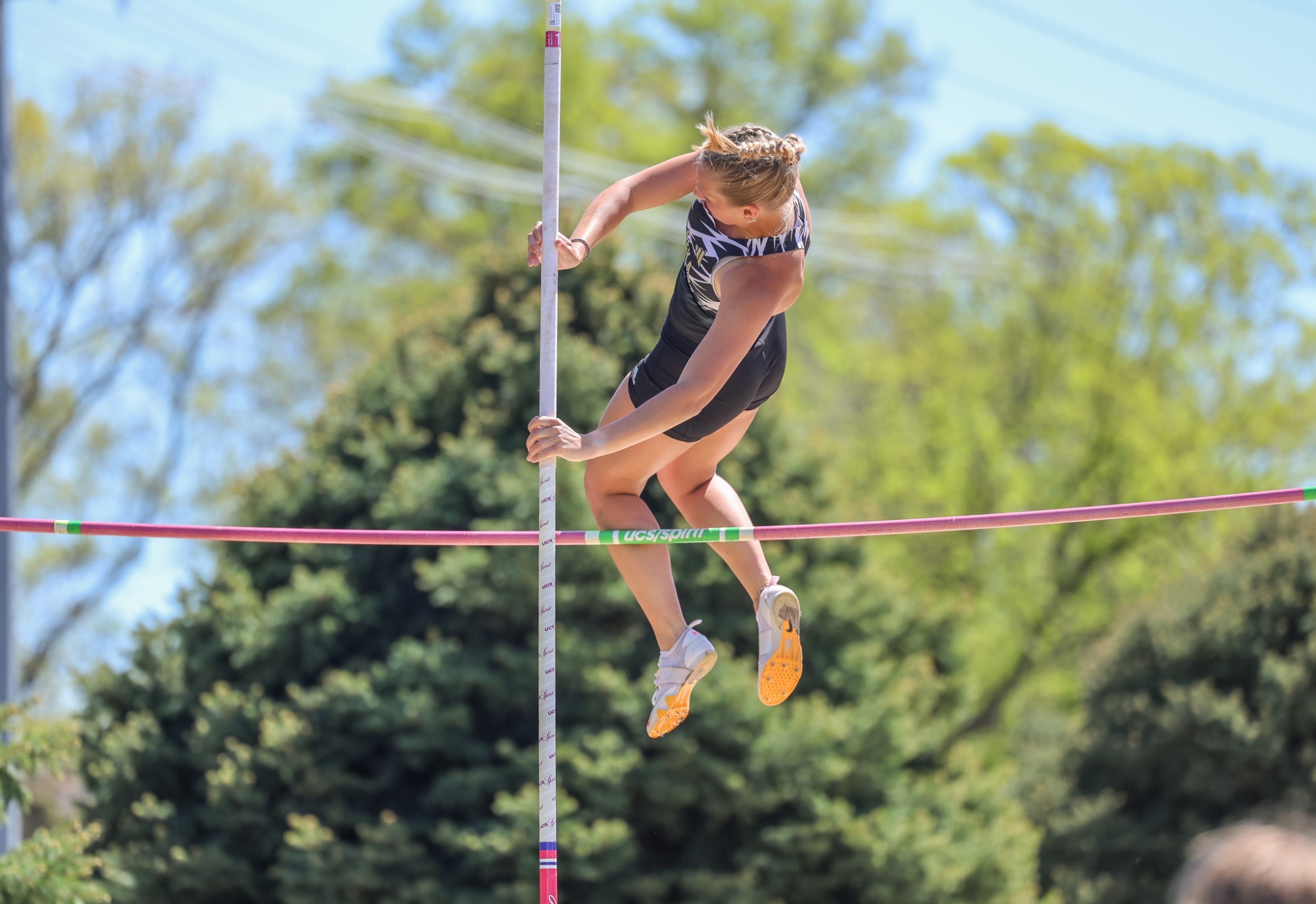 Sydnee Cheek clears the bar in the pole vault