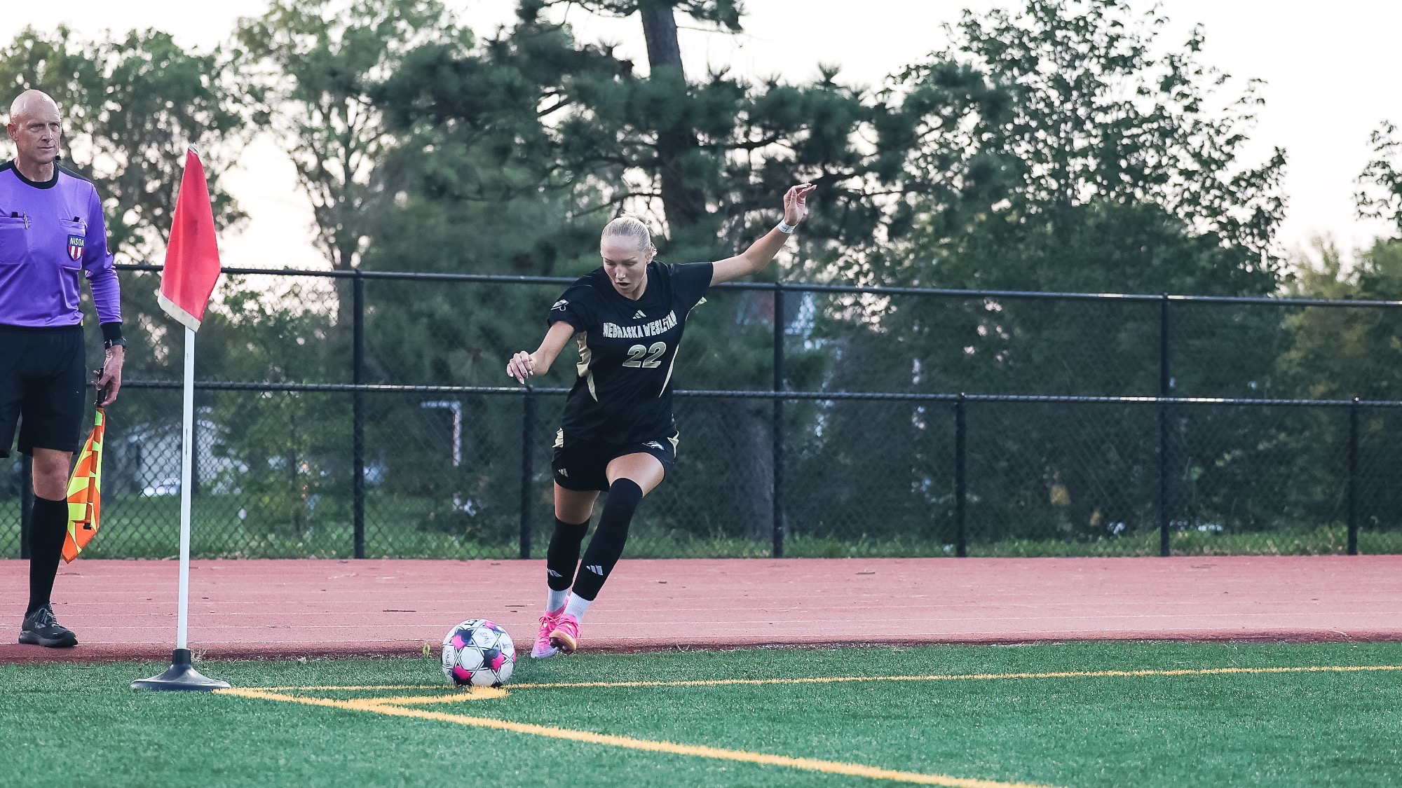 Berlyn Parker drives a corner in at Doane University