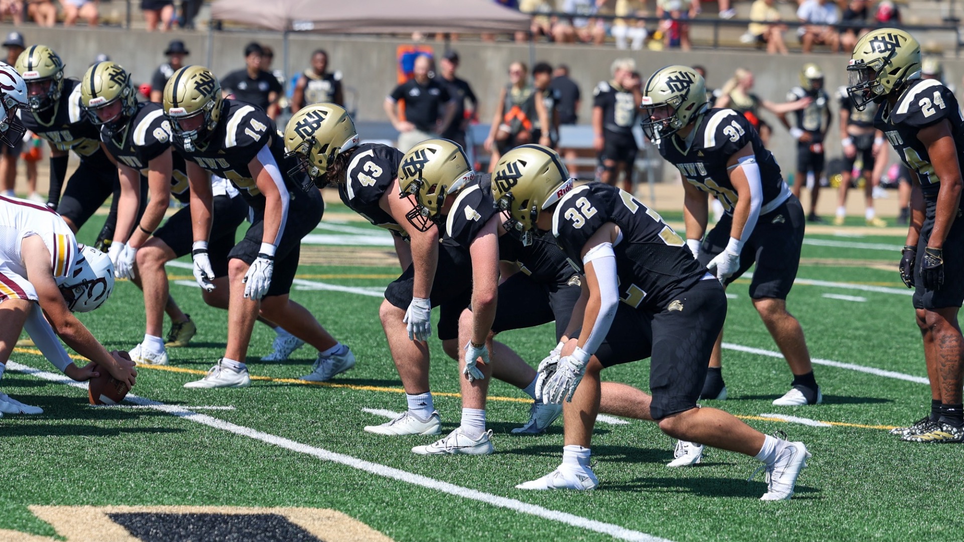 NWU football lines up to block a punt