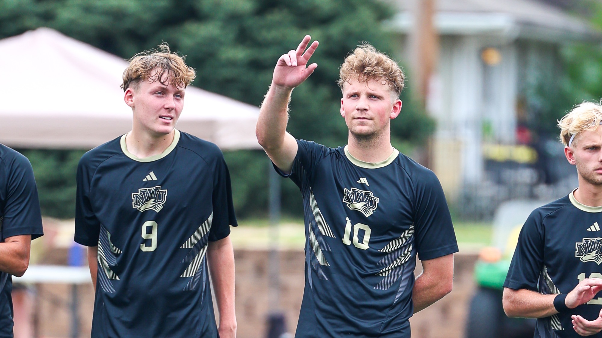 Owen Glogowski waves to the crowd after being introduced as a starter