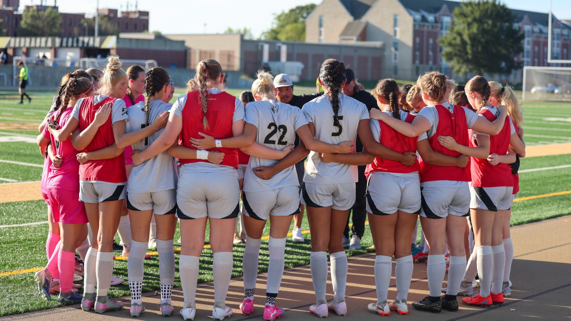 Women's Soccer Team Huddle