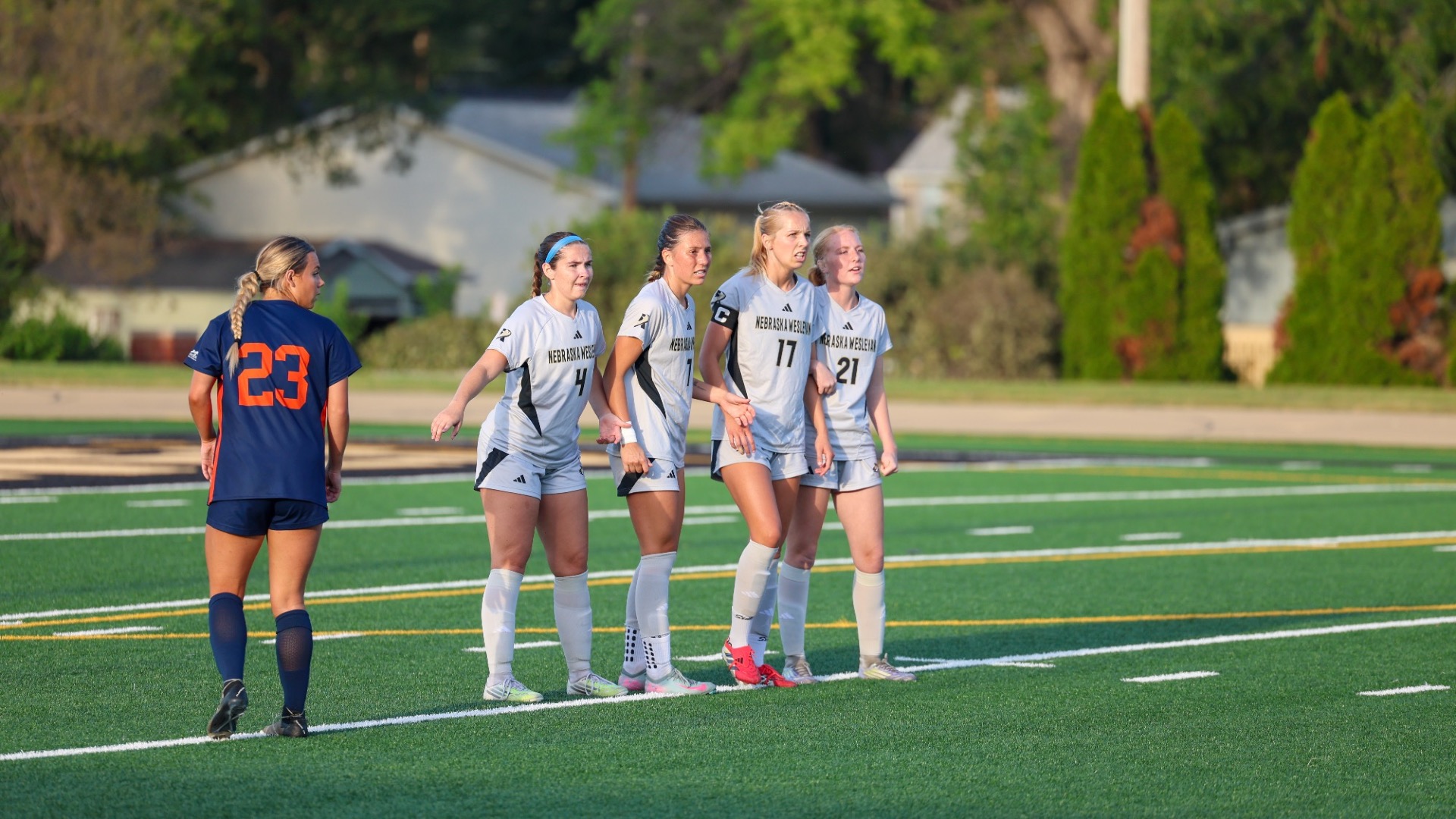 Four Prairie Wolves line up to block a free kick