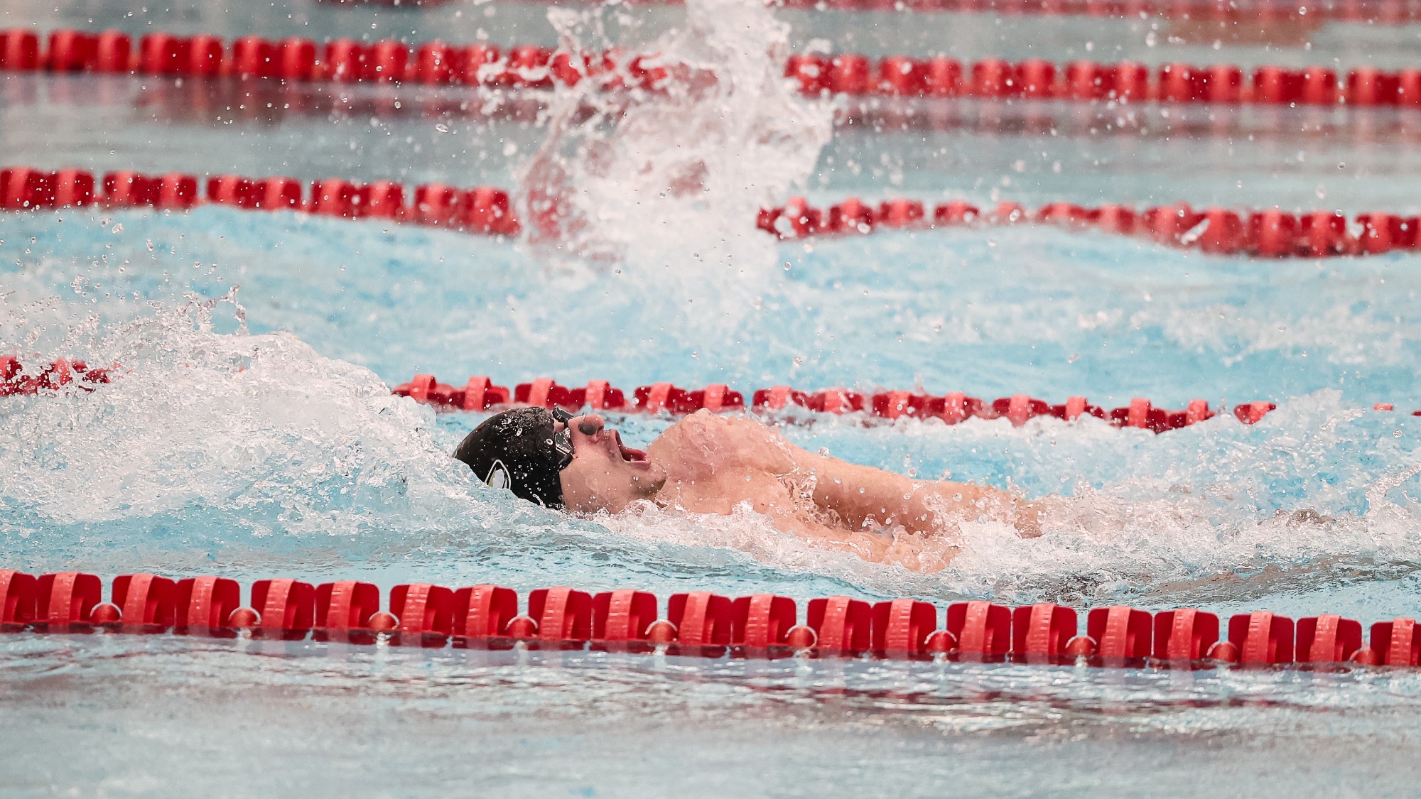 Taco Steiner swims the backstroke at the Good Life Relays
