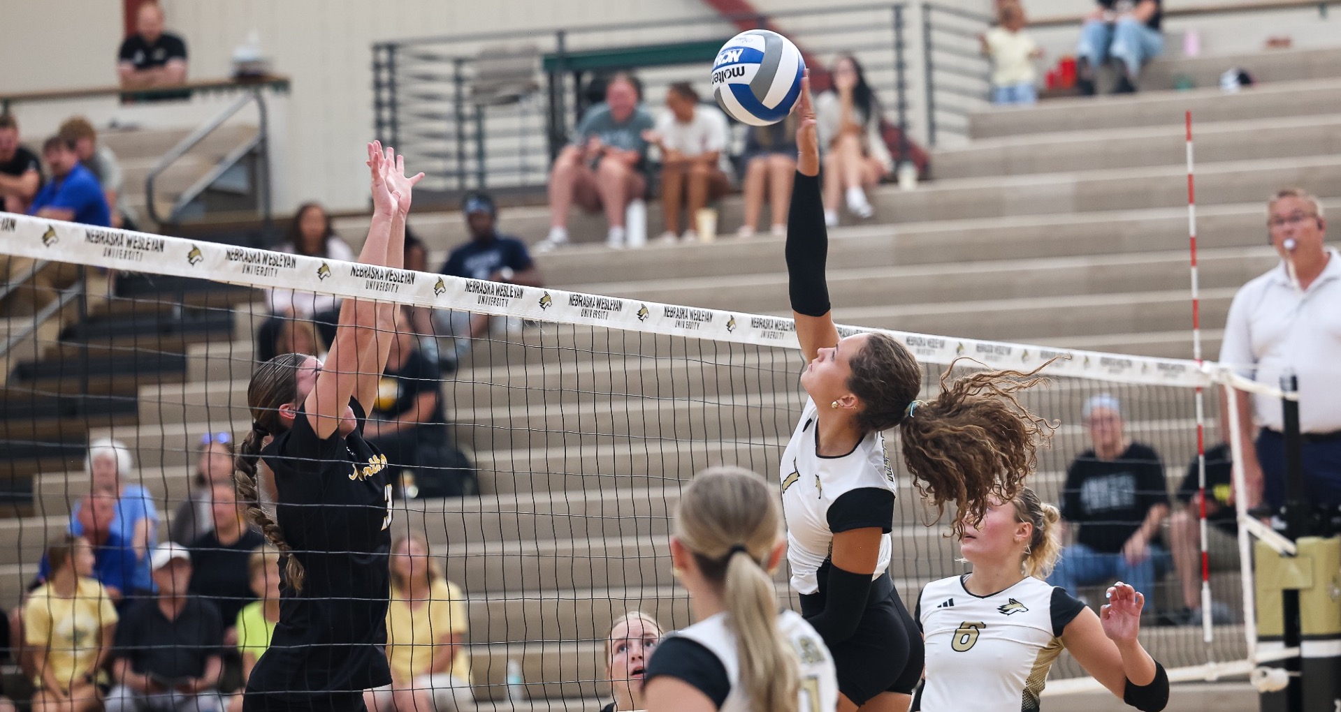 Ella Foote swings from the middle