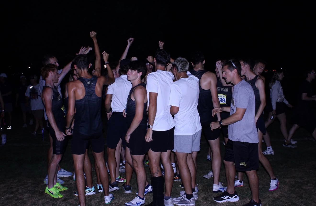 NWU Men's Cross Country team breaks huddle to start their first race of the year