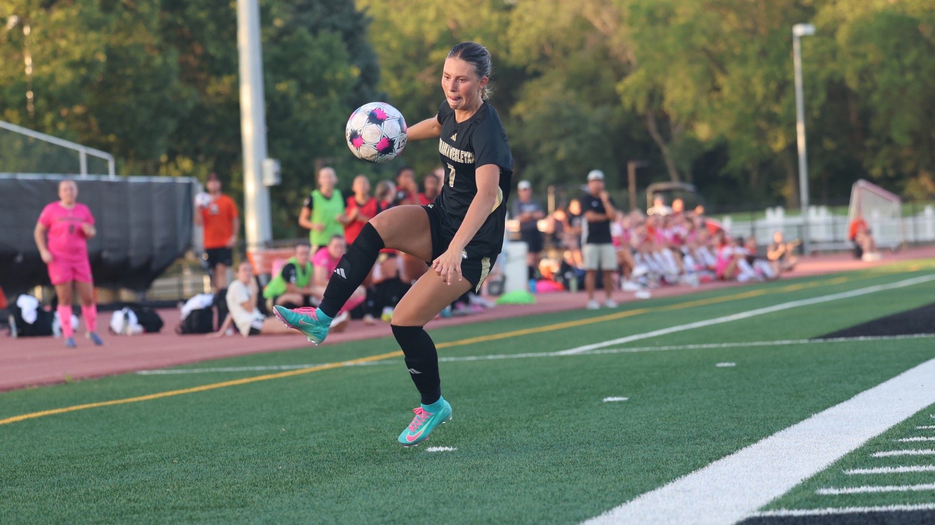 Nella Castaneda touches a ball