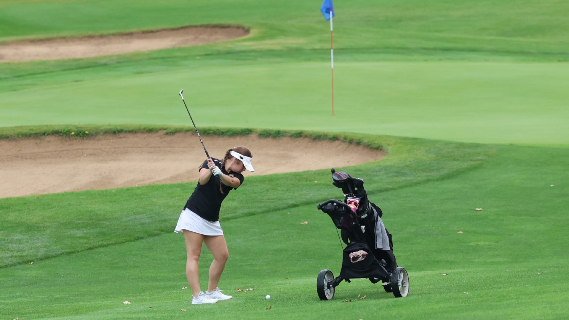 Cece Cronin in her backswing of her approach shot