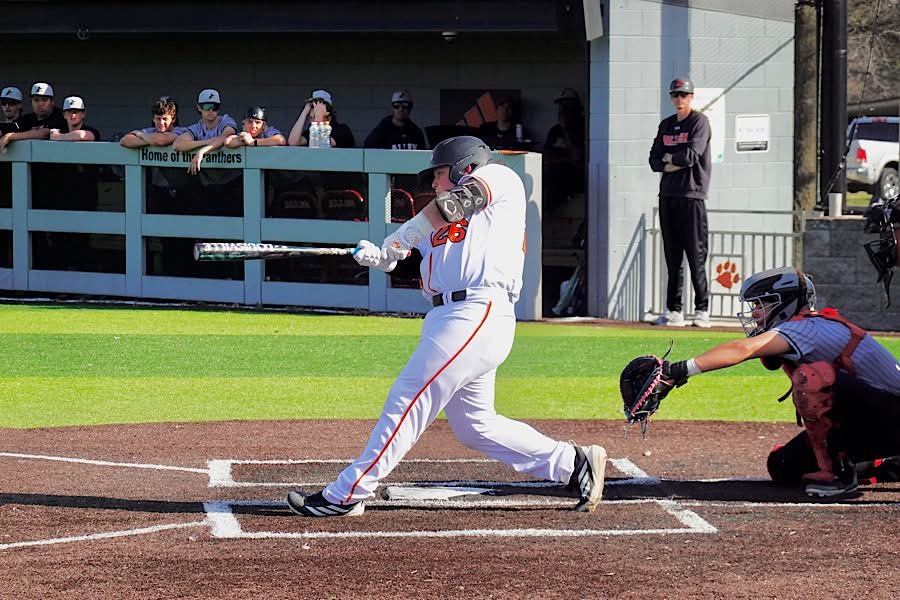 Tucker Akins with a home run against Allen. 