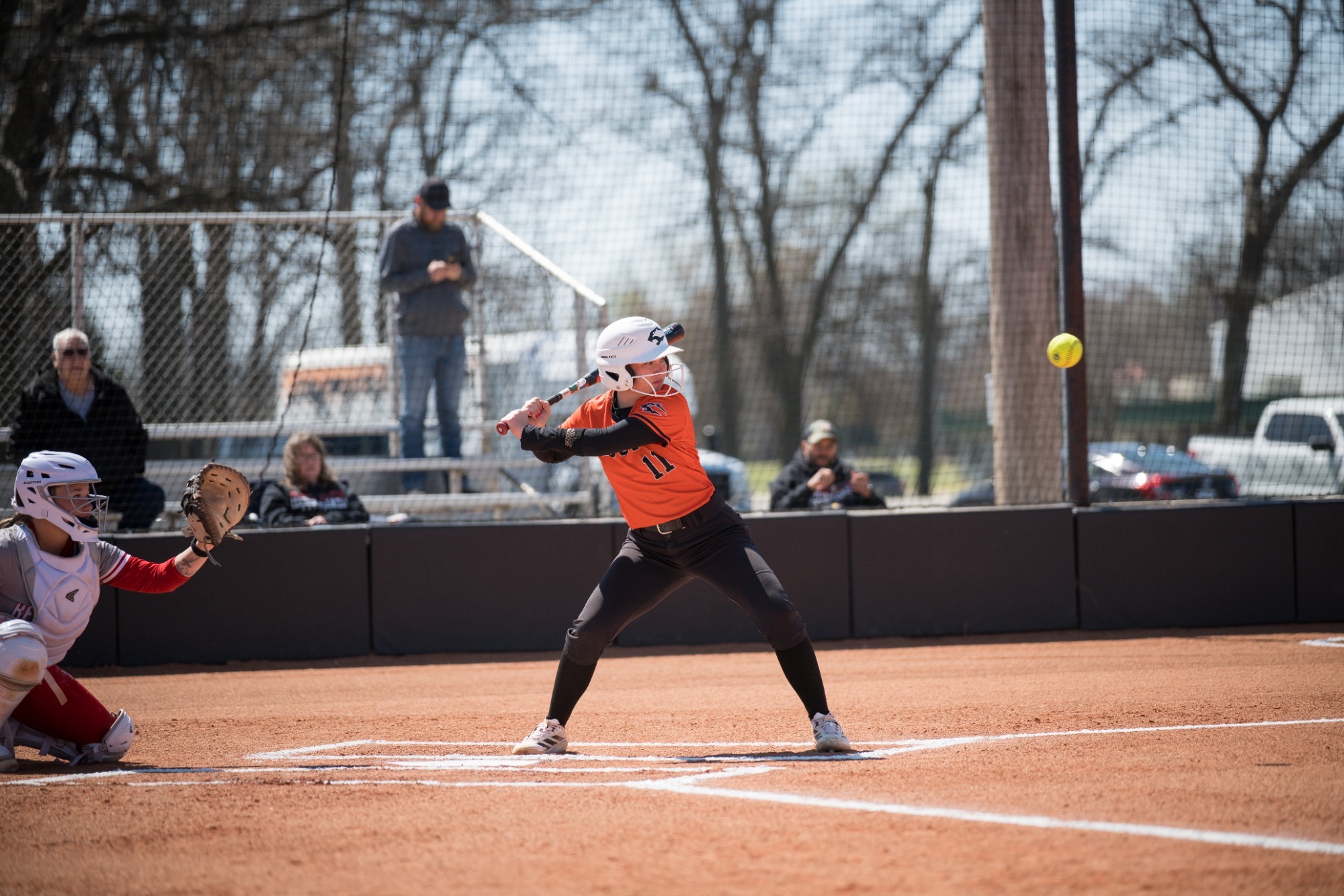 Neosho Softball Player at the Plate eyes on pitch coming in to hit