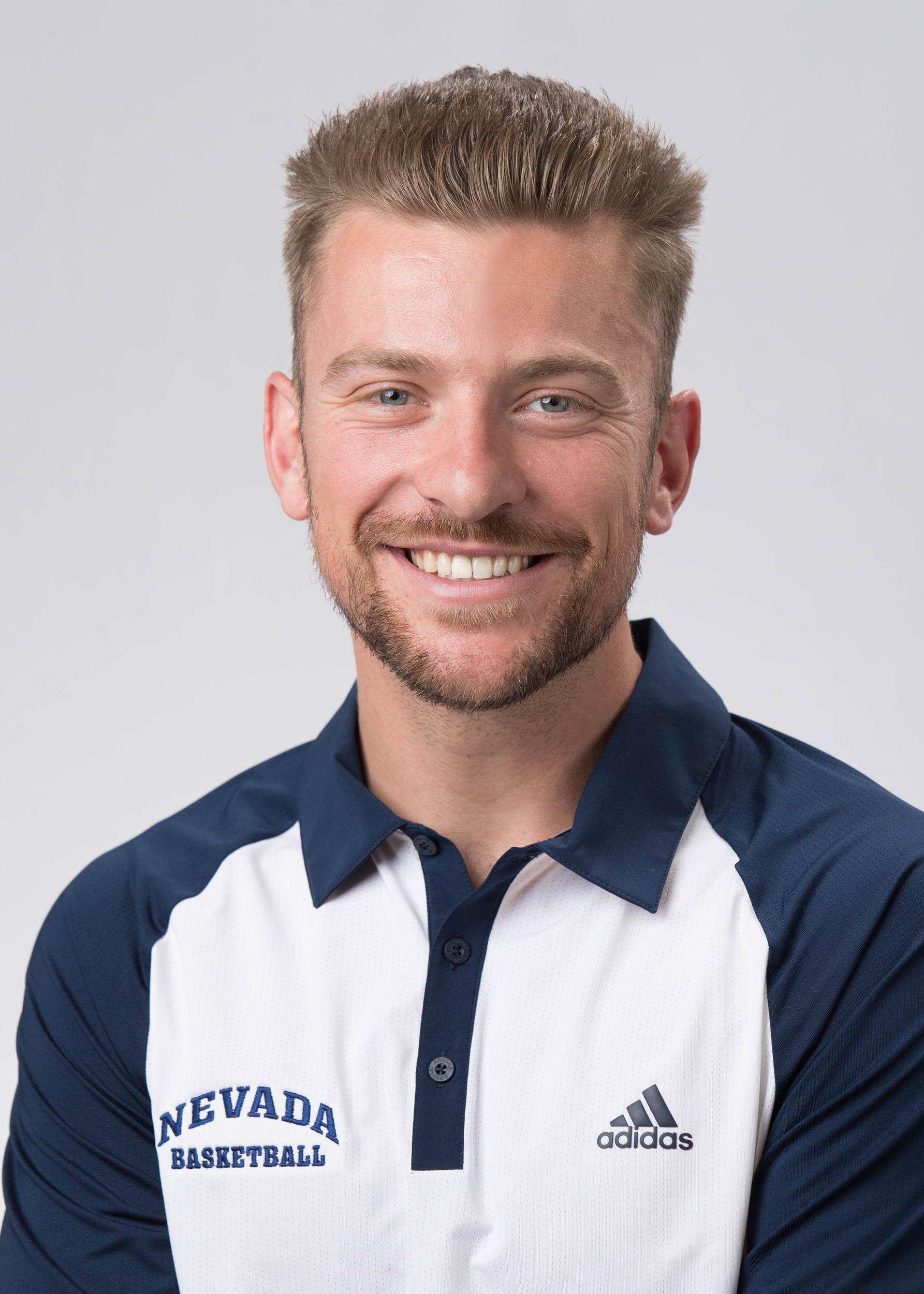 Men`s basketball head shot of Clinton Tremelling