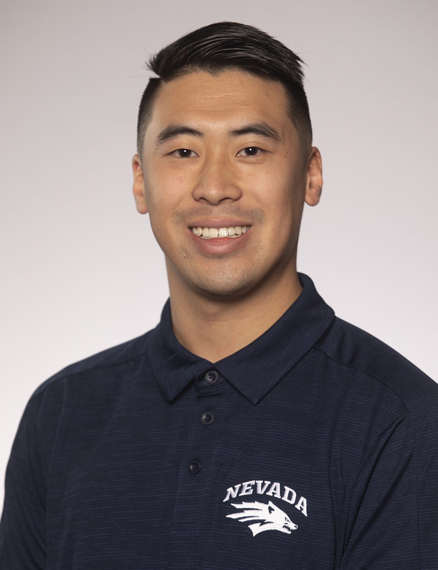 Nevada men's basketball graduate assistant Conrad Chow head shot for the 2019-20 season.