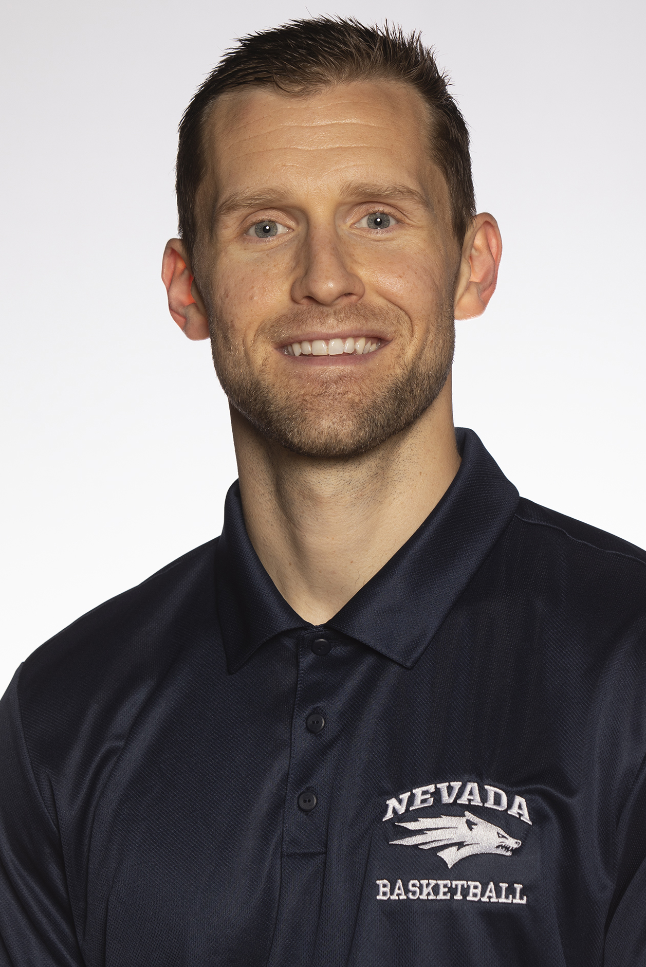 Men's basketball assistant coach Kory Barnett headshot for the 2019-20 season.