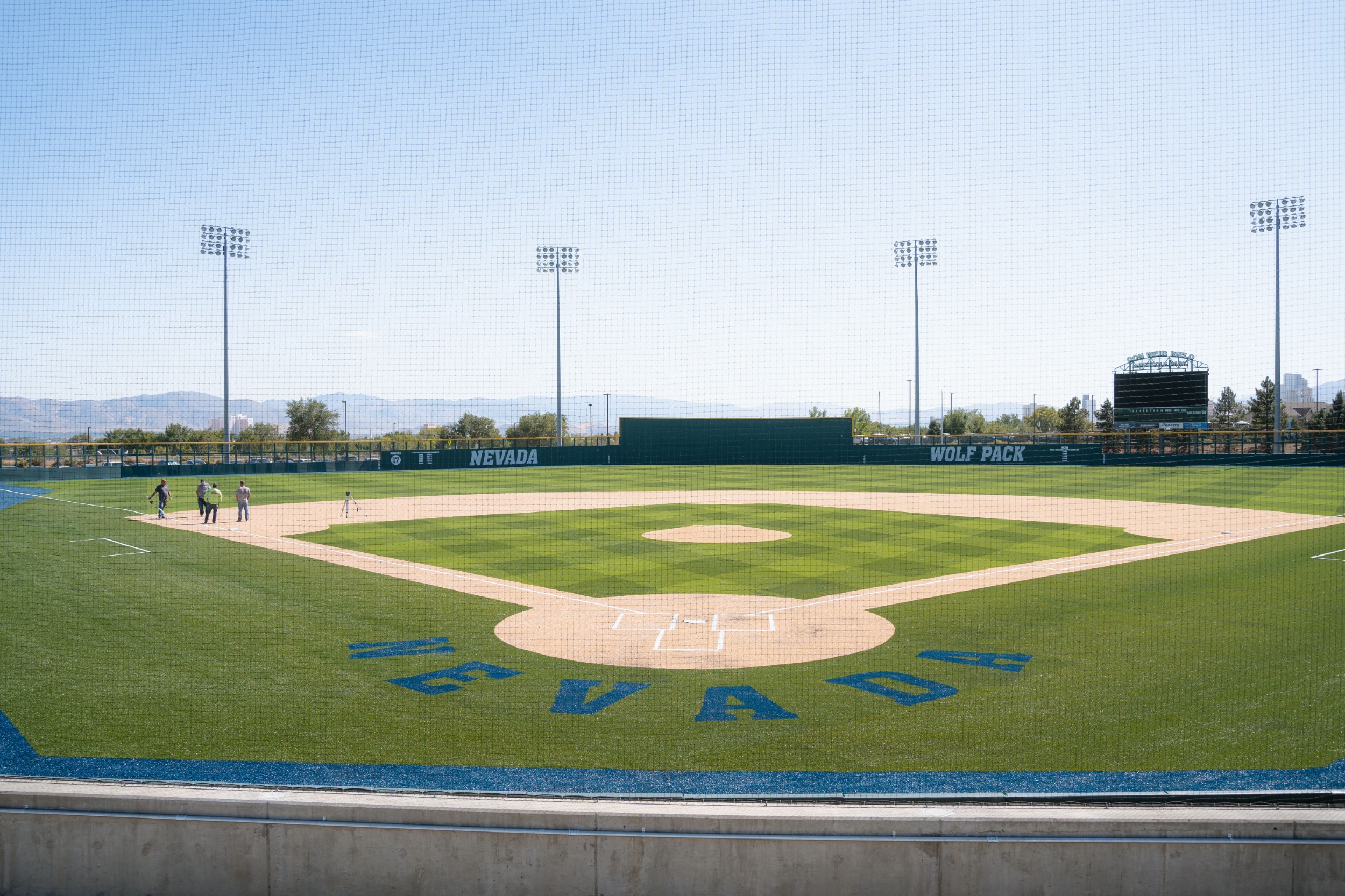Field-level shot of the Peccole Park turf from behind home plate