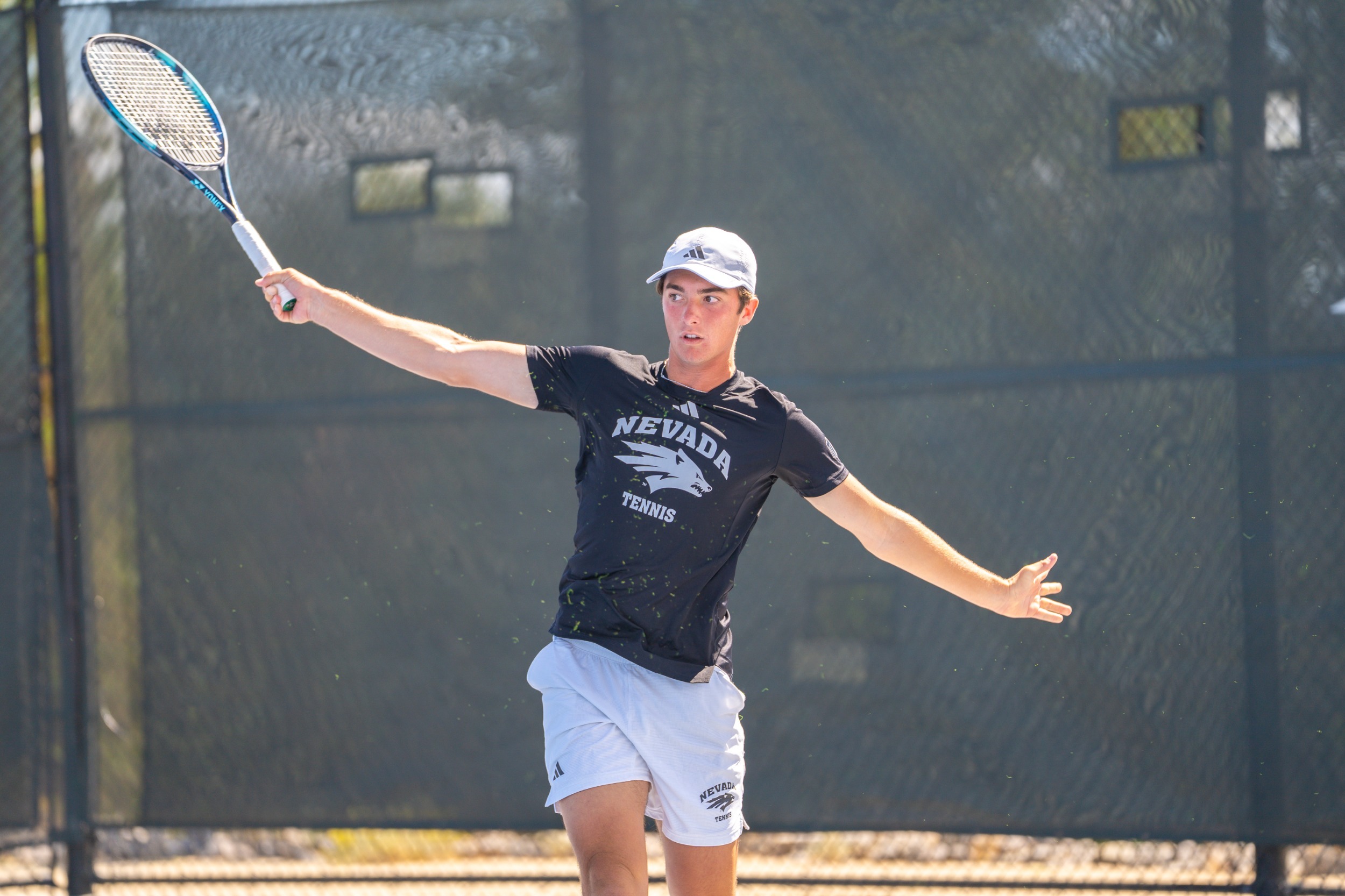 Sebastian Cressi with a backhand return