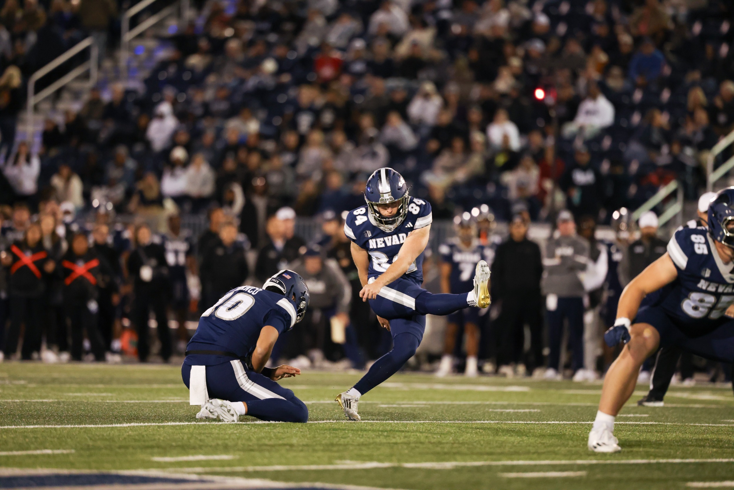 Joe McFadden follows through on a field goal attempt