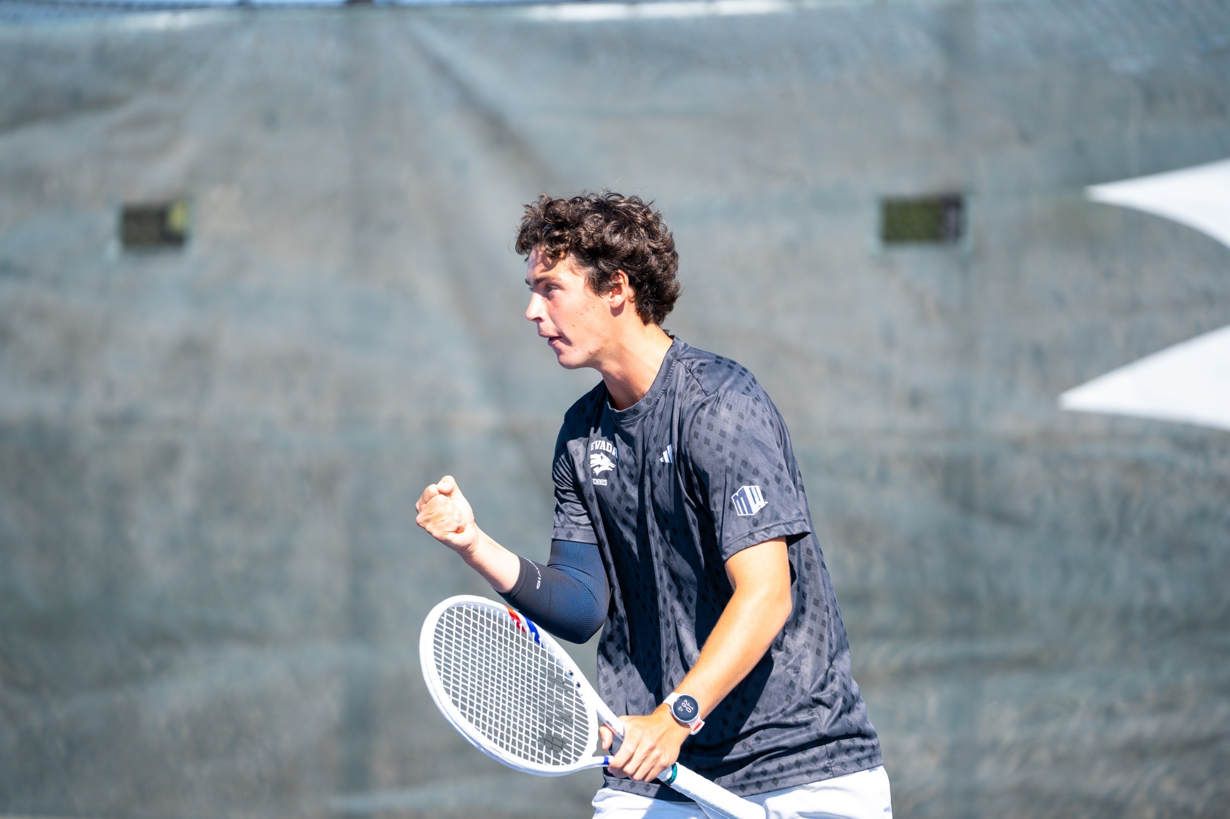 Axel Huysmans celebrates winning a point
