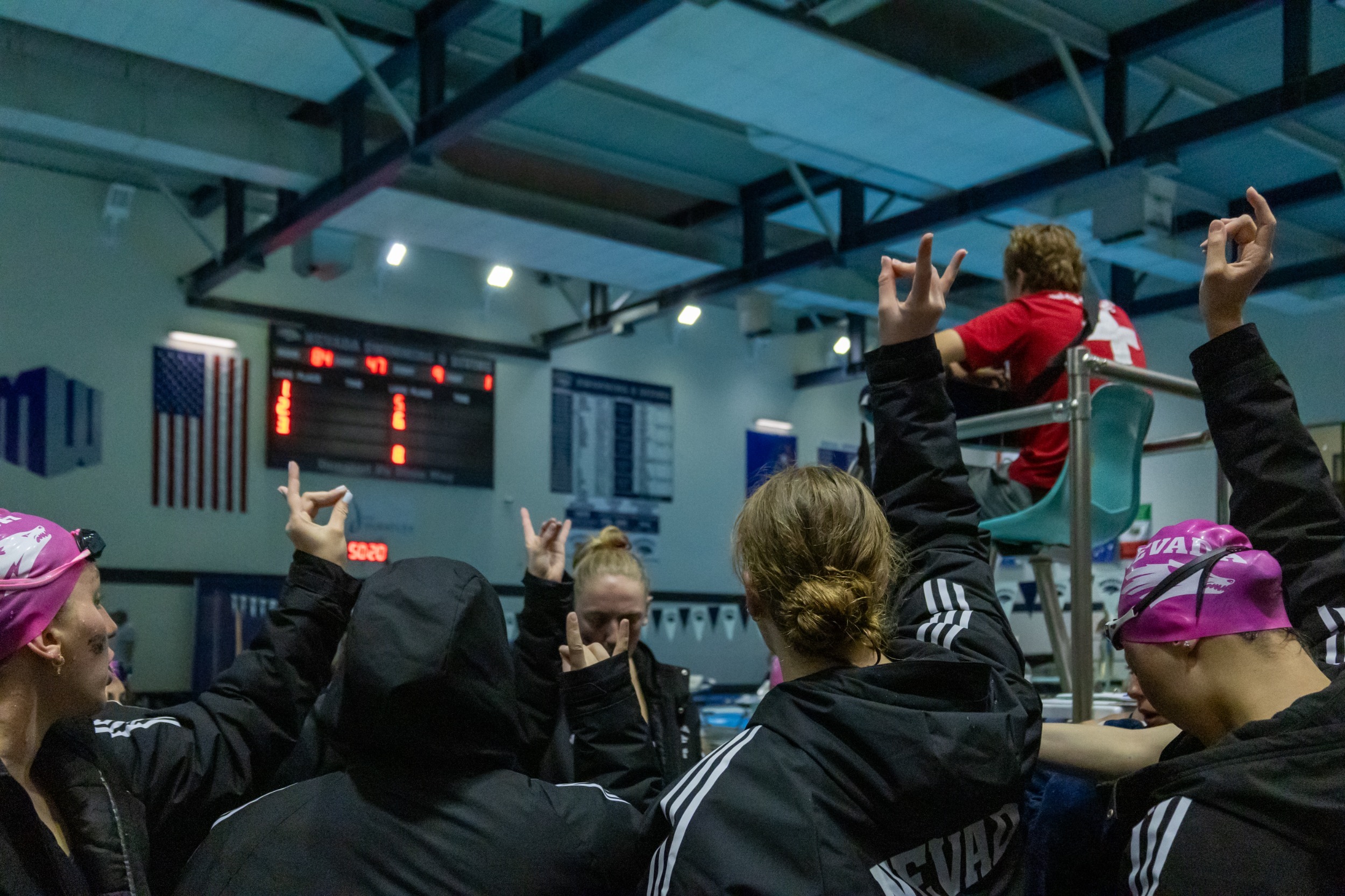 team huddle after the meet