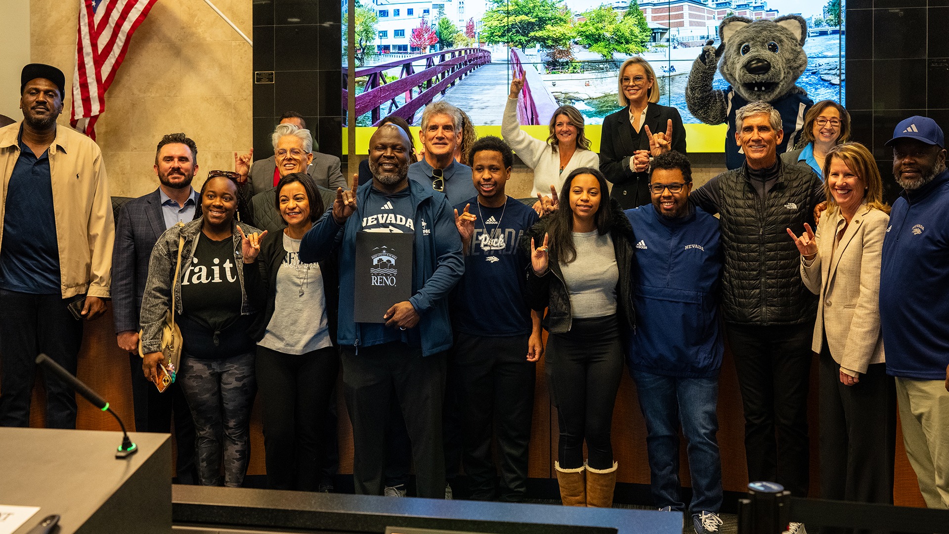 Eathan O'Bryant and the O'Bryant Family with Reno City Council posing for a photo
