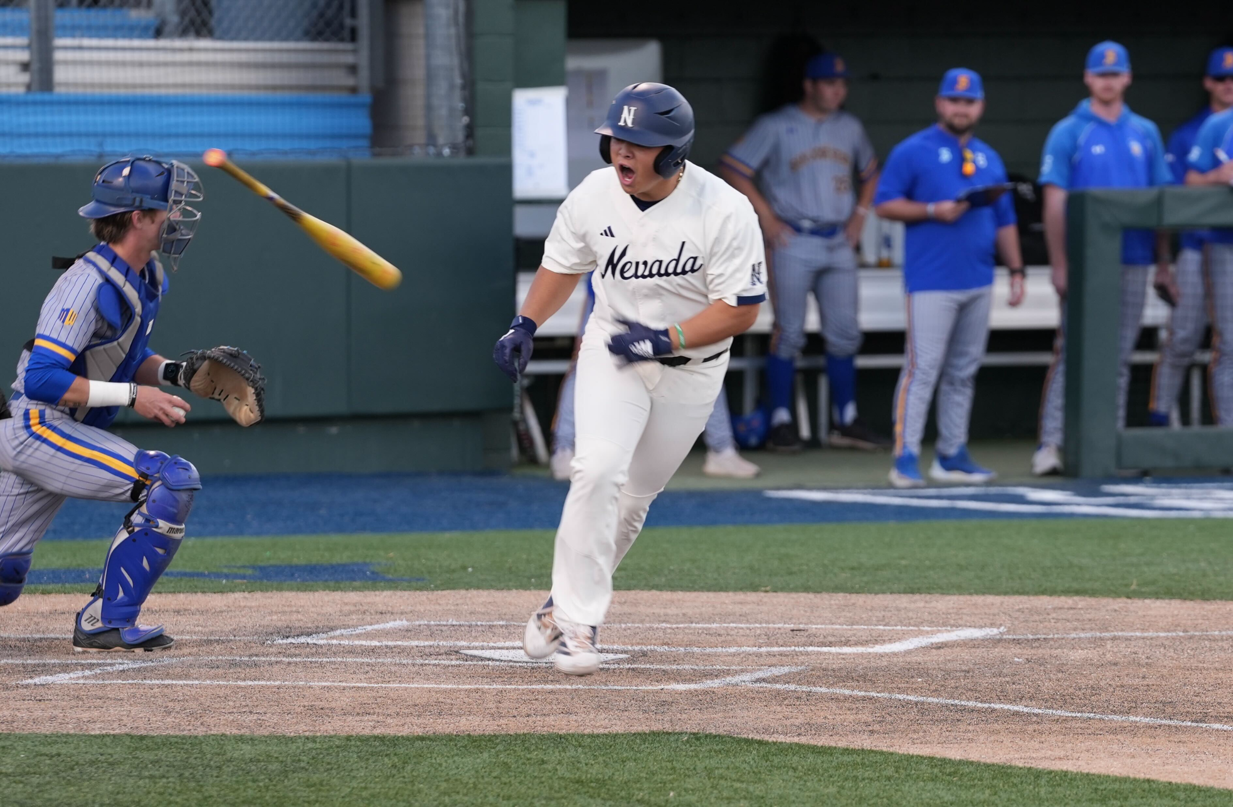 Sean Yamaguchi tosses his bat and exits the batter's box