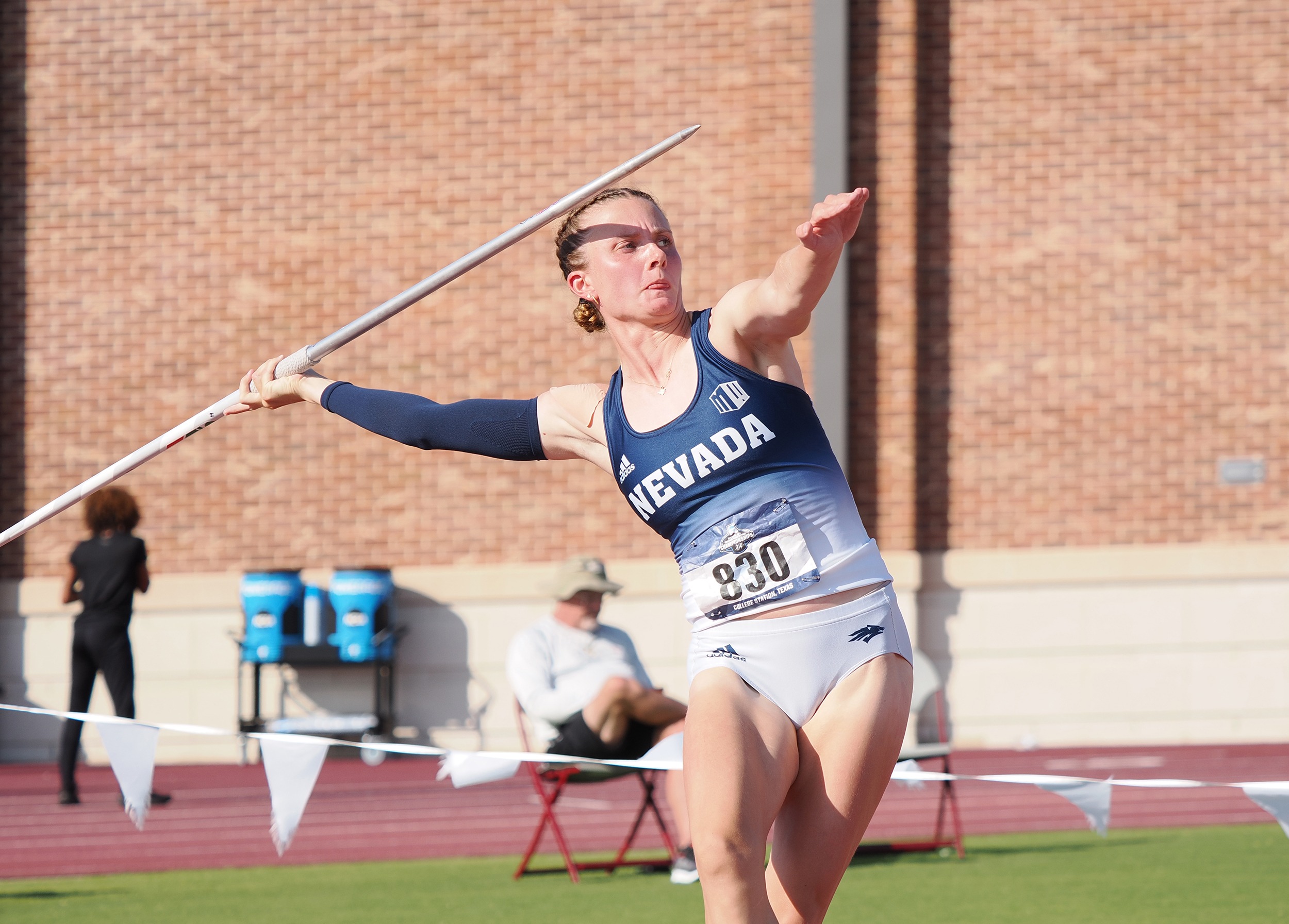 Lilly Urban stepping forward in a javelin throw
