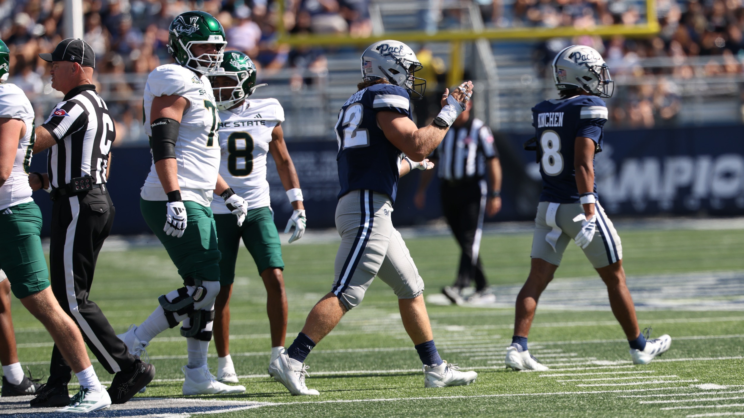 Dylan LaBarbara clapping his hands after making a tackle