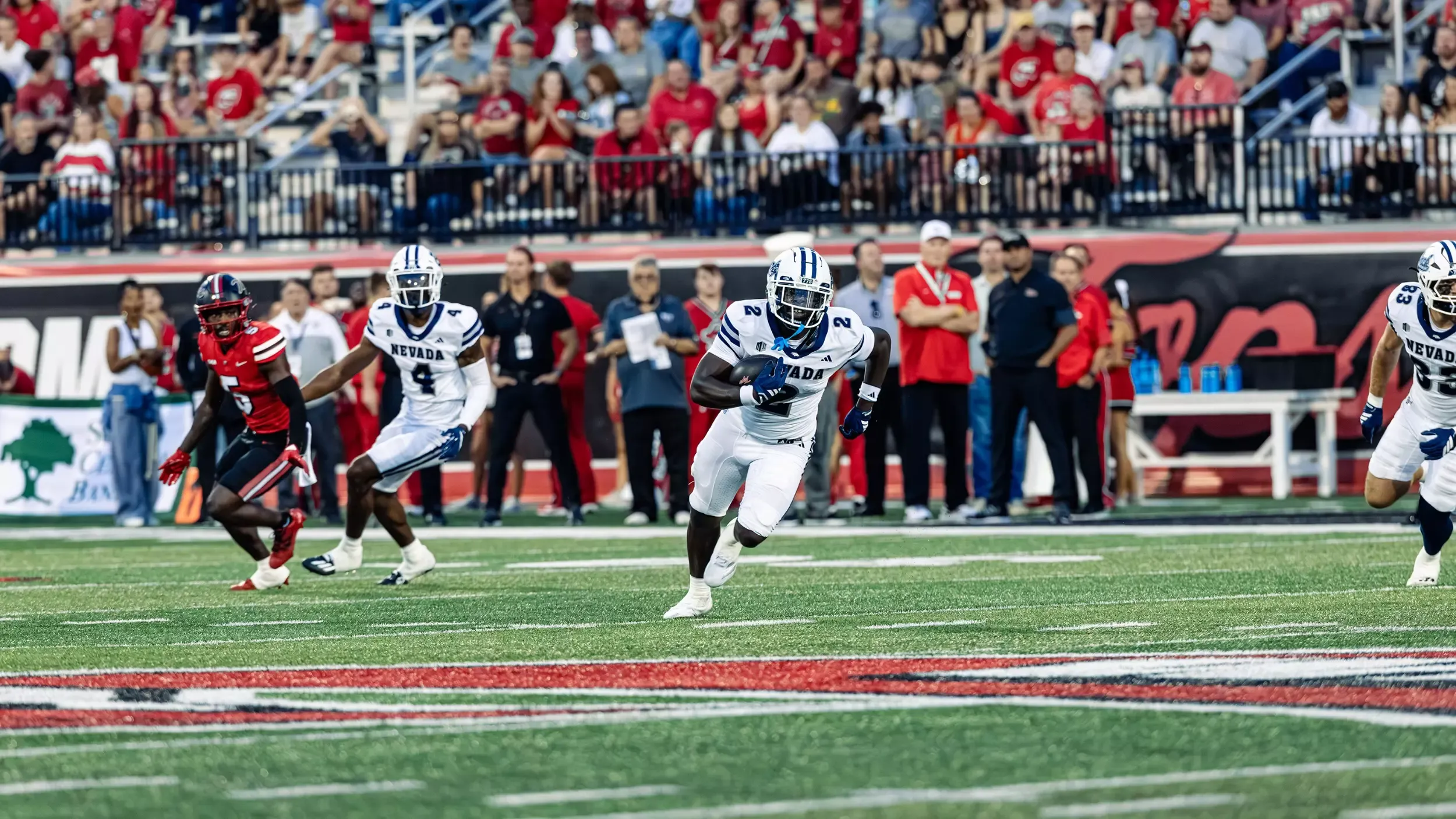 EJ Smith running with the football after an interception