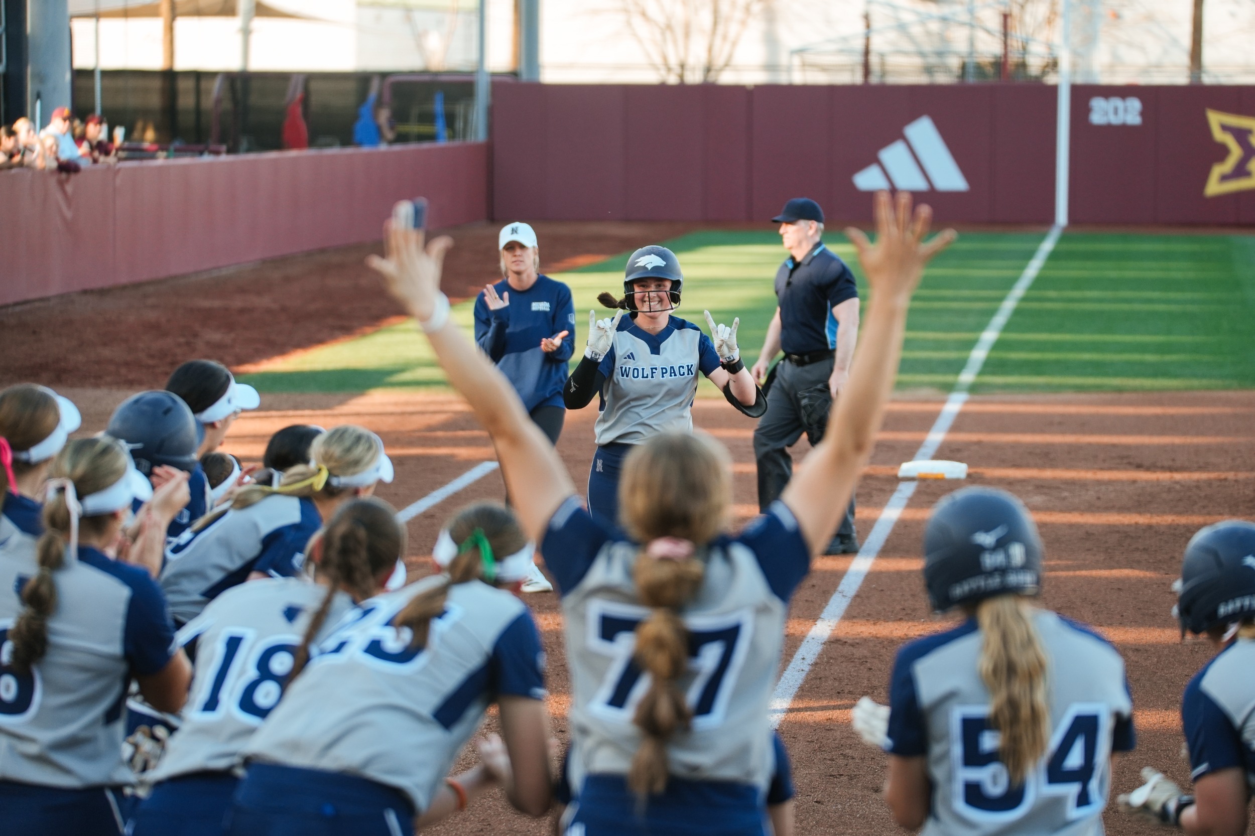 Talia tretton team celebration after homer