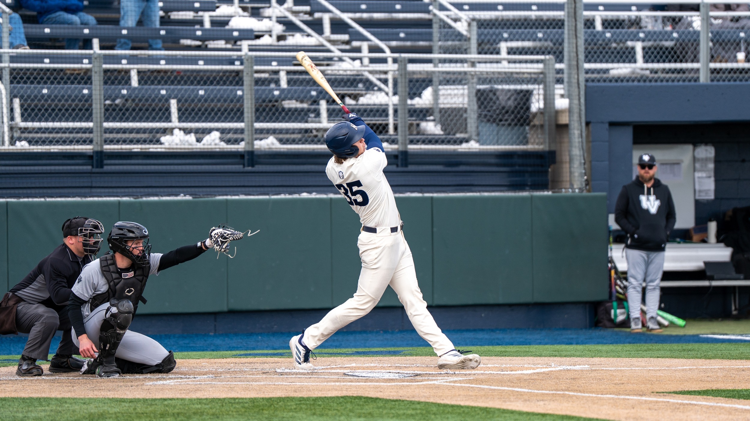 Jacob Doyle in the follow-through of his swing