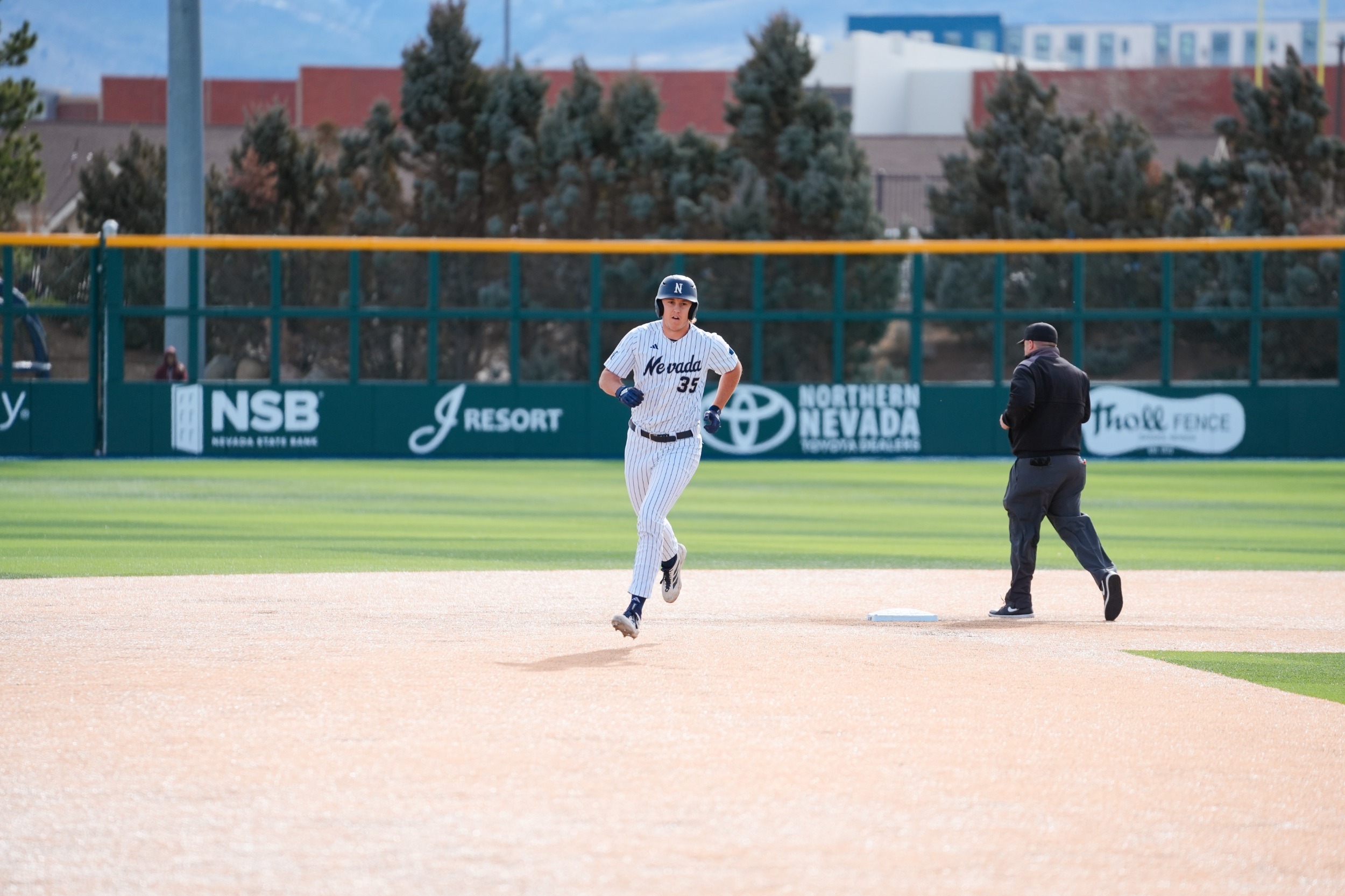 Jacob Doyle rounds second base on his home run trot