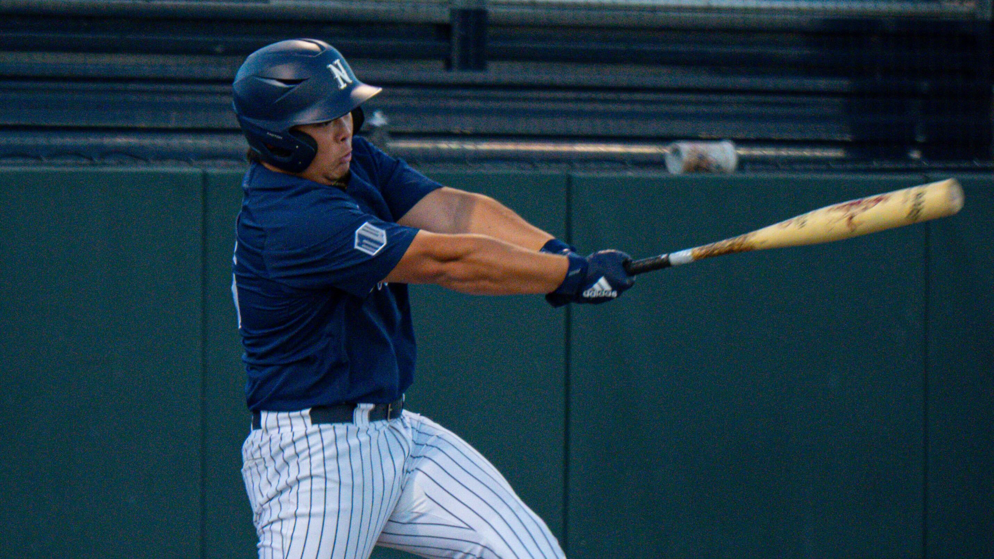 Sean Yamaguchi connects on a swing for a home run