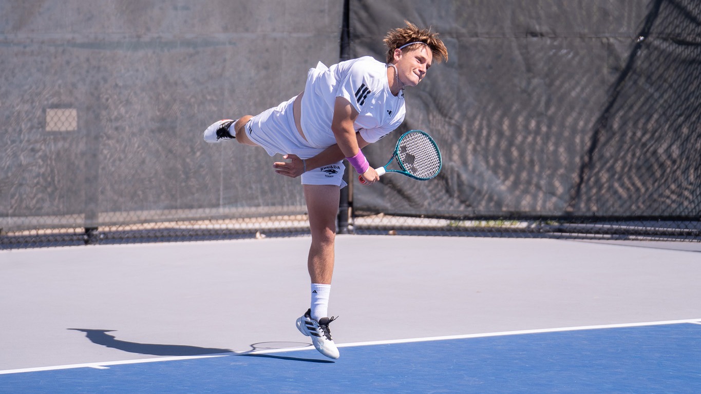 Max Contet follows through on a serve